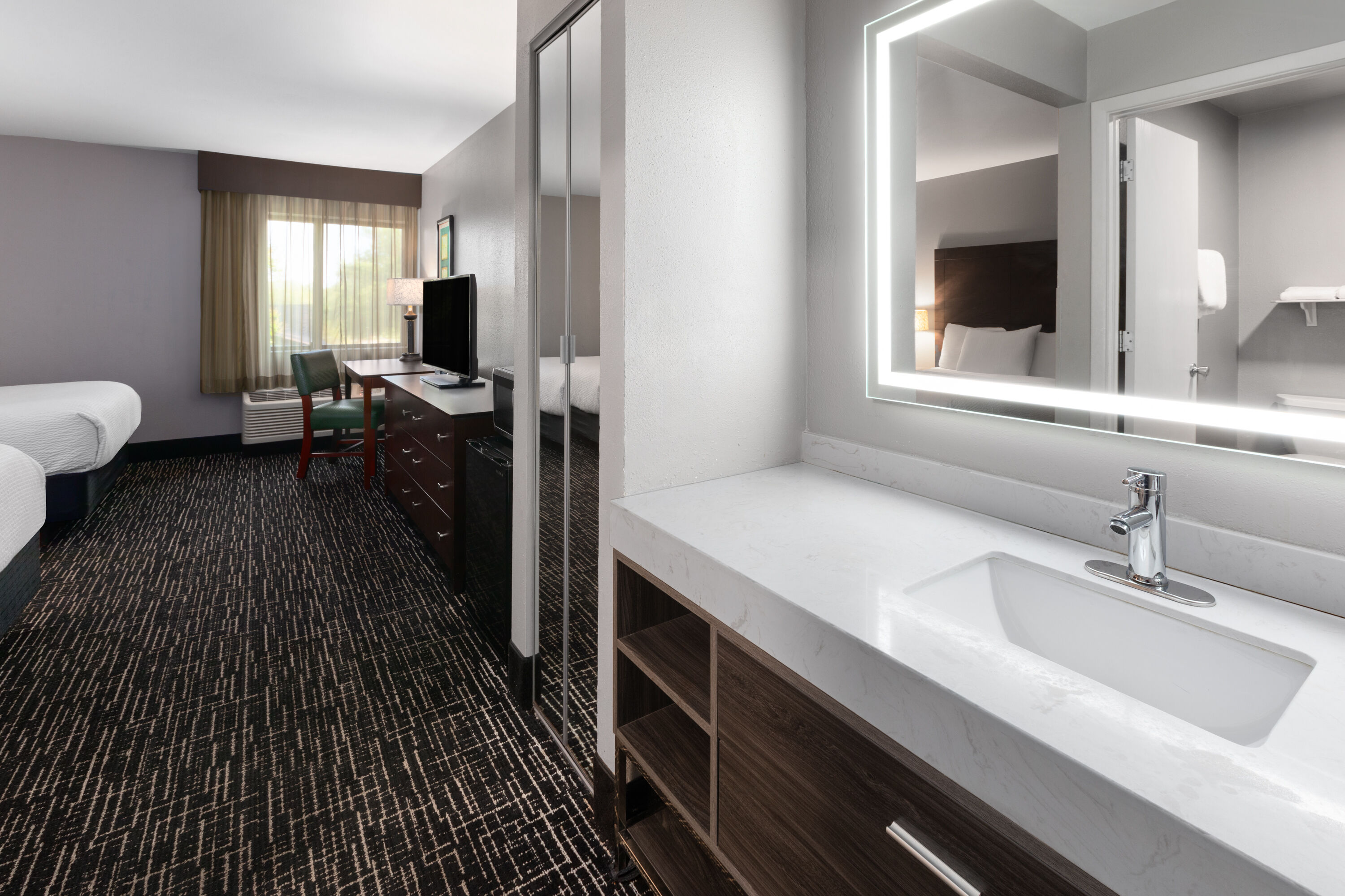 Guest room bath at the La Quinta Inn by Wyndham Sheboygan in Sheboygan, Wisconsin