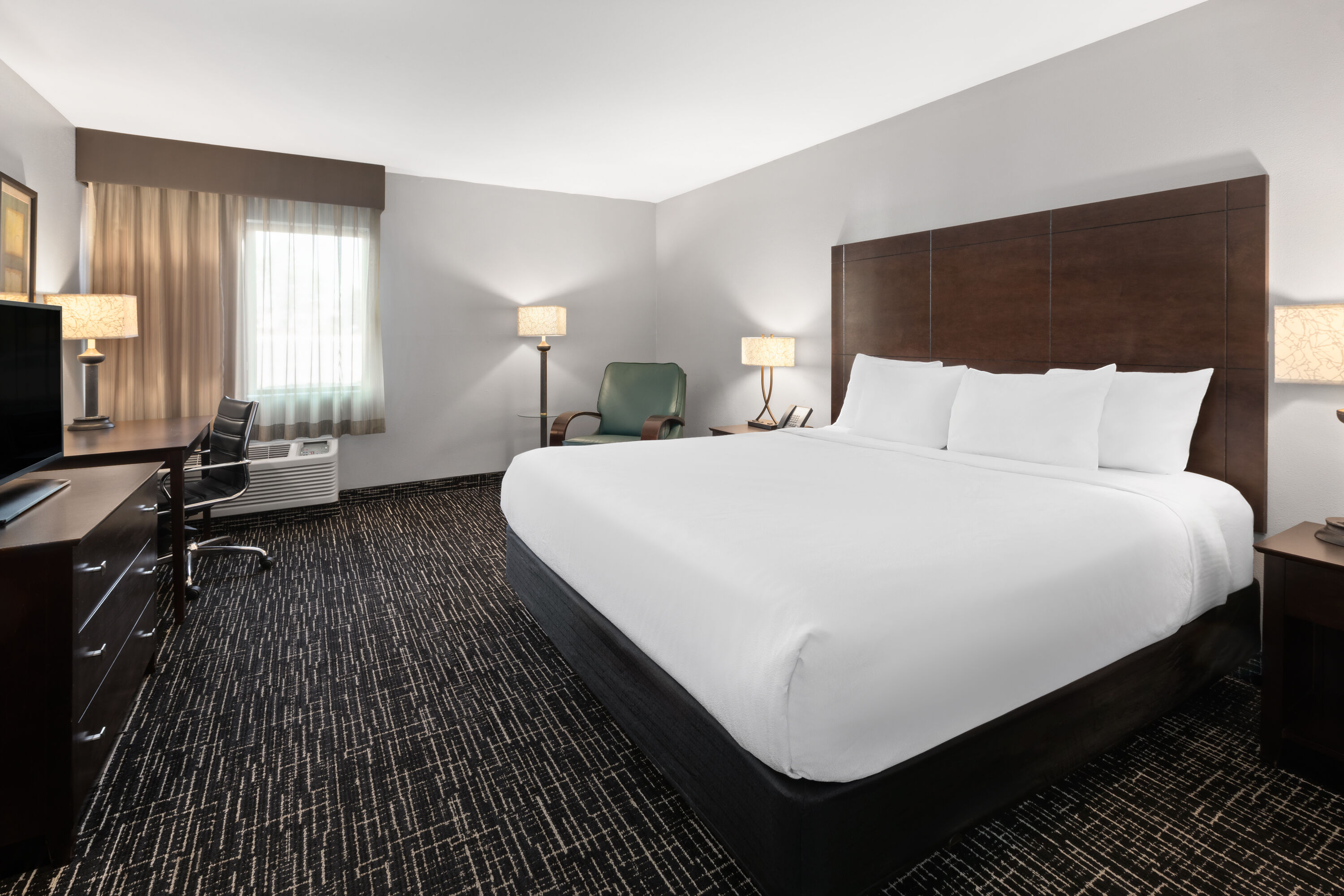 Guest room at the La Quinta Inn by Wyndham Sheboygan in Sheboygan, Wisconsin