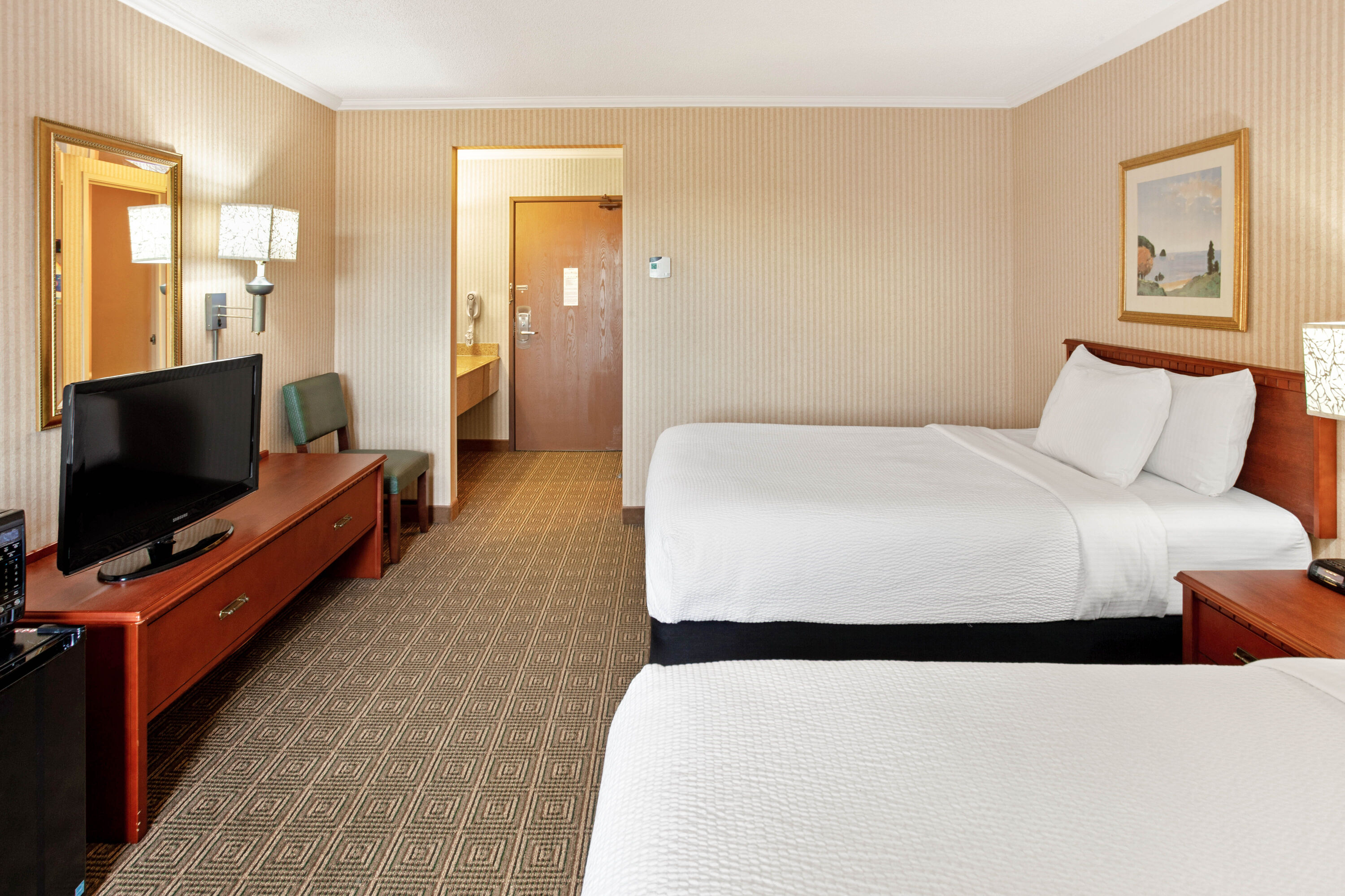 Guest room at the La Quinta Inn & Suites by Wyndham Stevens Point in Stevens Point, Wisconsin