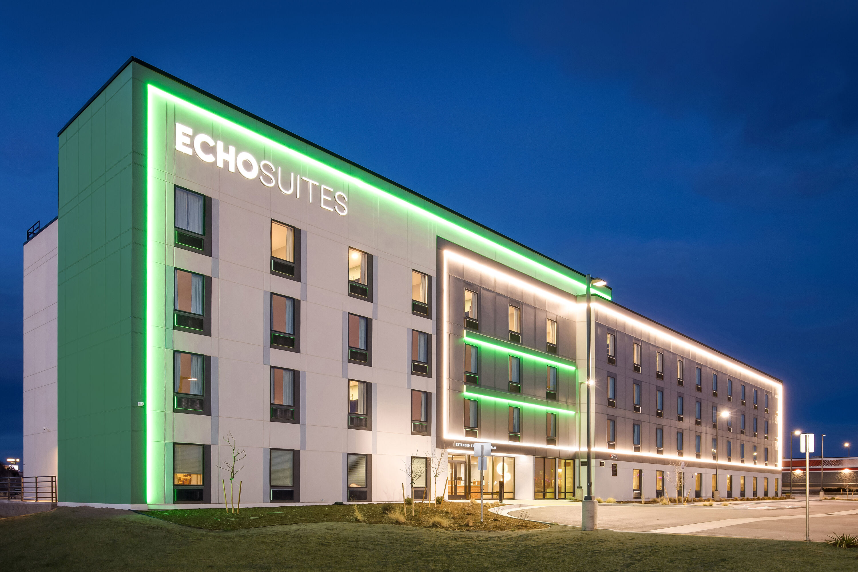 Exterior Night Image of ECHO Suites Extended Stay by Wyndham Colorado Springs Airpt hotel in Colorado Springs, Colorado