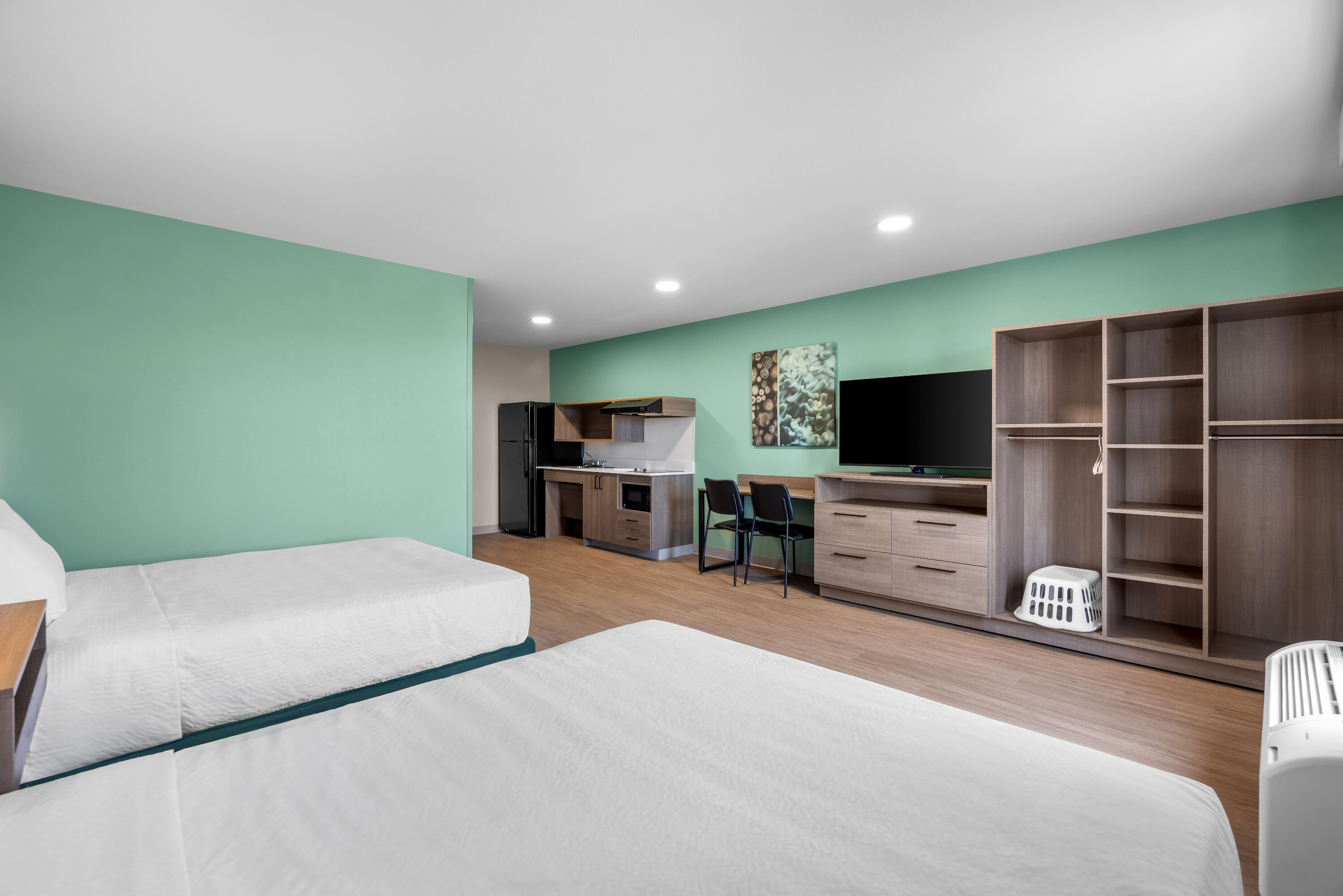 Double bed guest room at the ECHO Suites Extended Stay by Wyndham Colorado Springs Airpt in Colorado Springs, Colorado