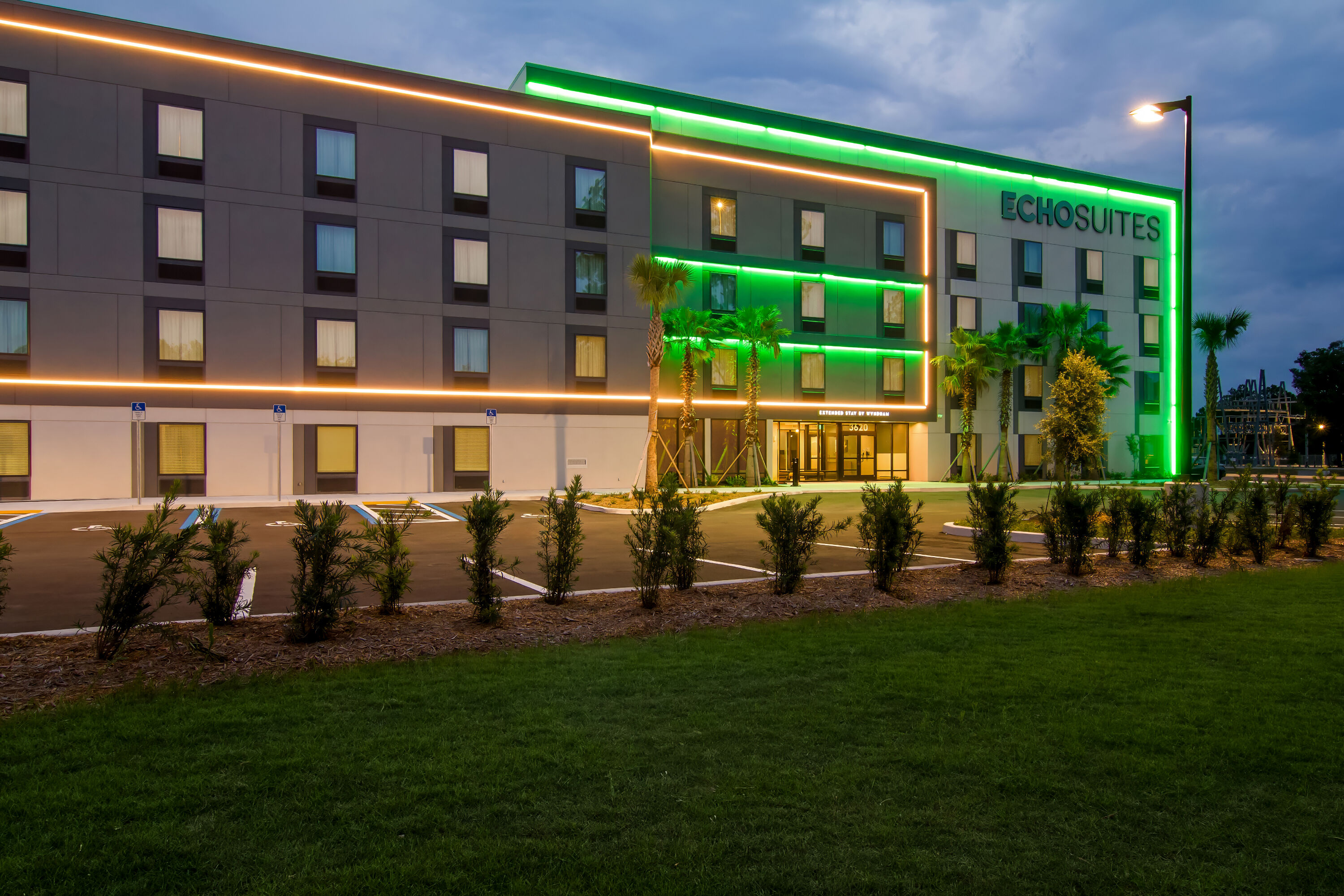 Exterior Night Image of ECHO Suites Extended Stay by Wyndham Middleburg hotel in Middleburg, Florida