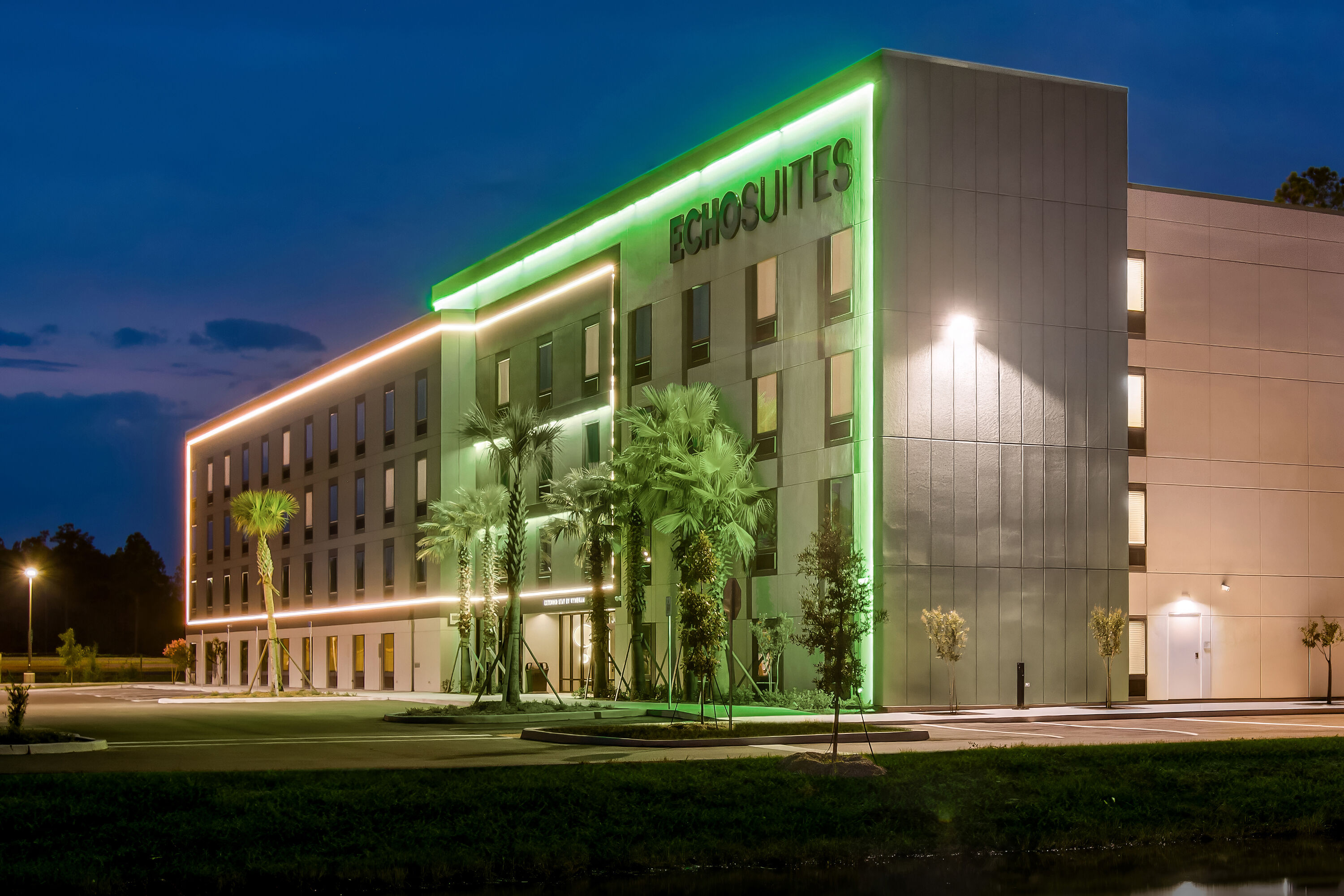 Exterior Night Image of ECHO Suites Extended Stay by Wyndham Middleburg hotel in Middleburg, Florida