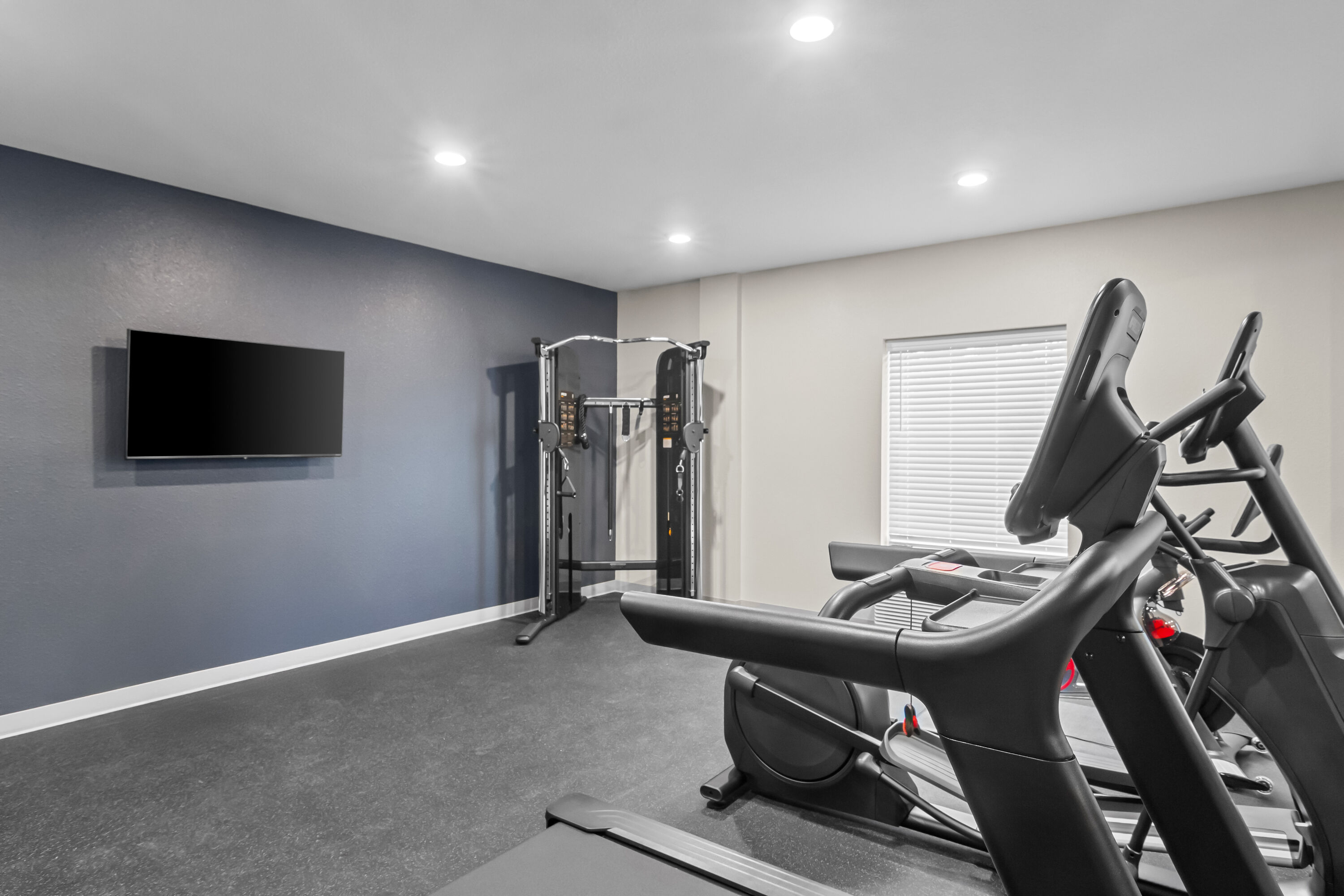 Fitness room at ECHO Suites Extended Stay by Wyndham Middleburg in Middleburg, Florida