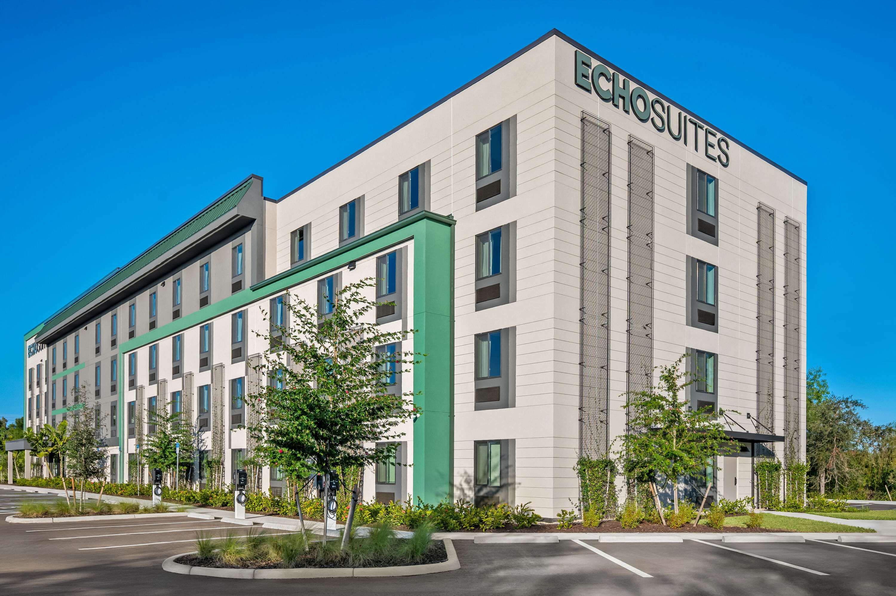 Exterior Day Image of ECHO Suites Extended Stay by Wyndham Naples hotel in Naples, Florida