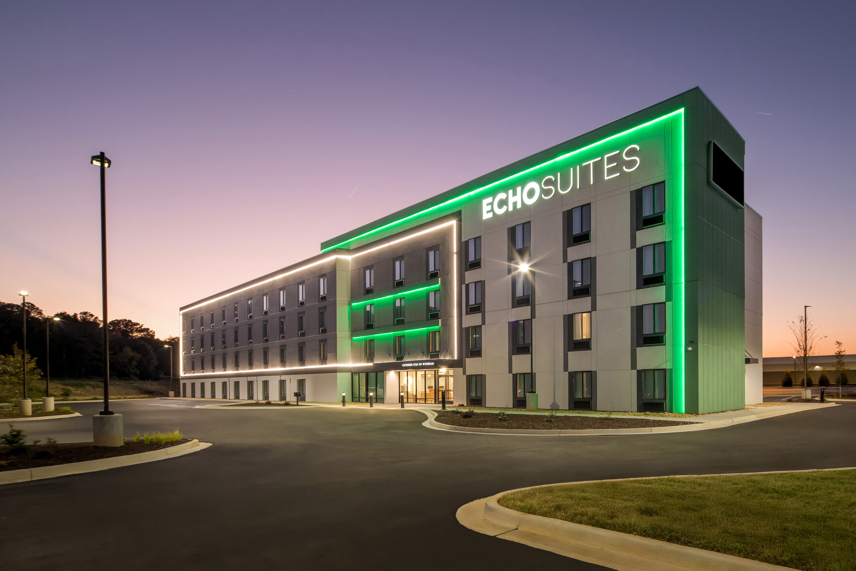 Exterior Night Image of ECHO Suites Extended Stay by Wyndham Conyers hotel in Conyers, Georgia
