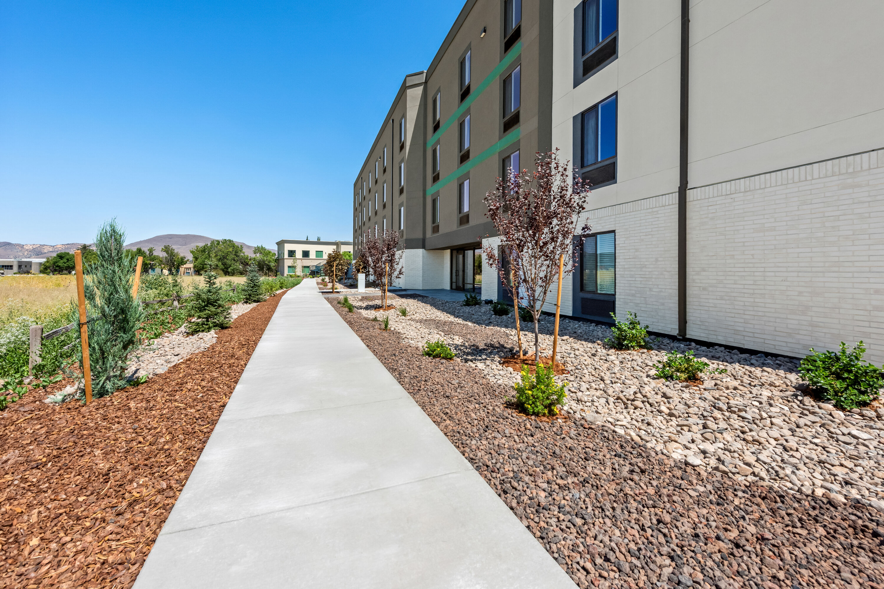 Side Exterior Image of ECHO Suites Extended Stay by Wyndham Reno hotel in Reno, Nevada