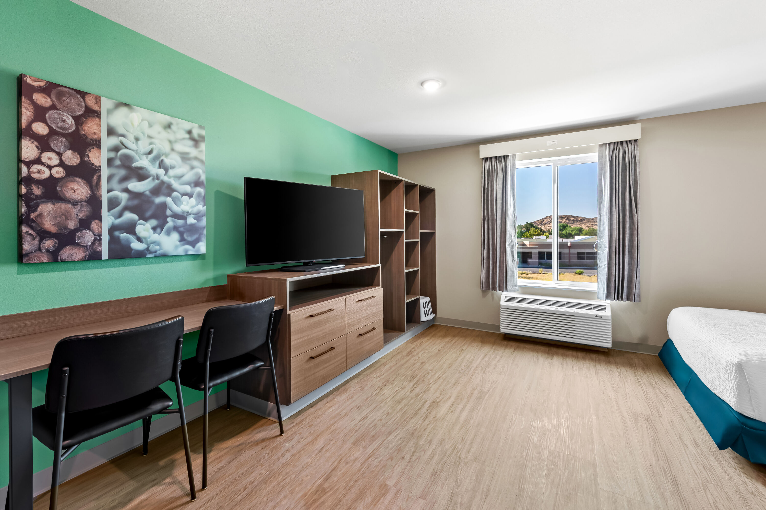 Double bed guest room at the ECHO Suites Extended Stay by Wyndham Reno in Reno, Nevada