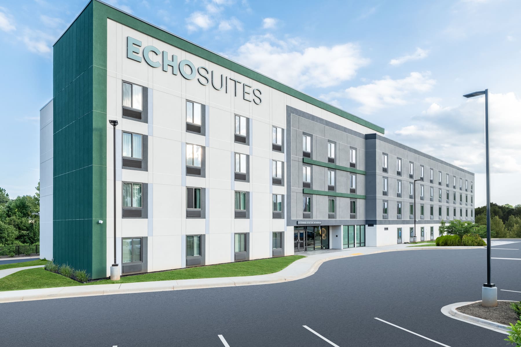 Exterior Day Image of ECHO Suites Extended Stay by Wyndham Spartanburg hotel in Spartanburg, South Carolina