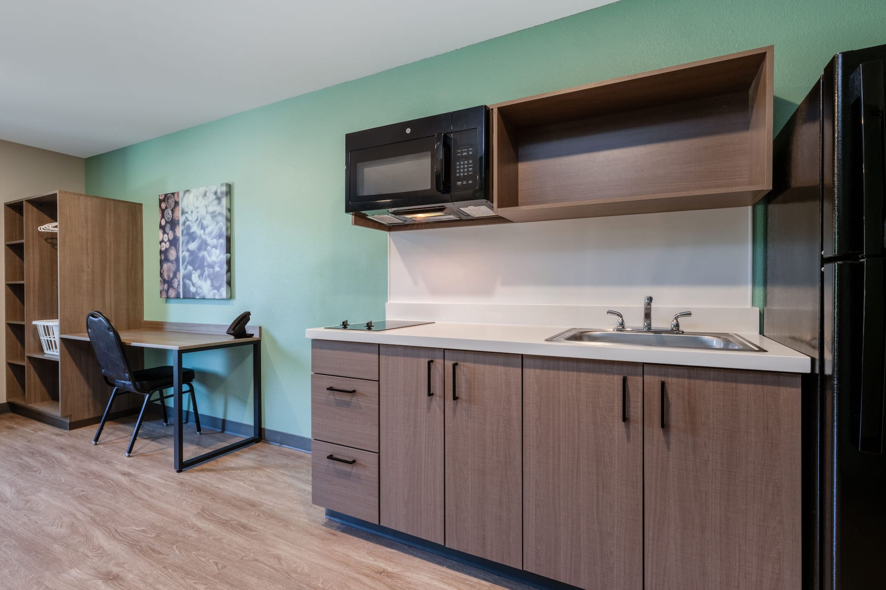 Guest room at the ECHO Suites Extended Stay by Wyndham Spartanburg in Spartanburg, South Carolina