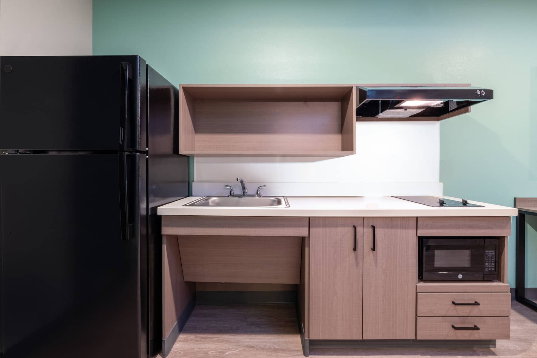 Guest room at the ECHO Suites Extended Stay by Wyndham Spartanburg in Spartanburg, South Carolina