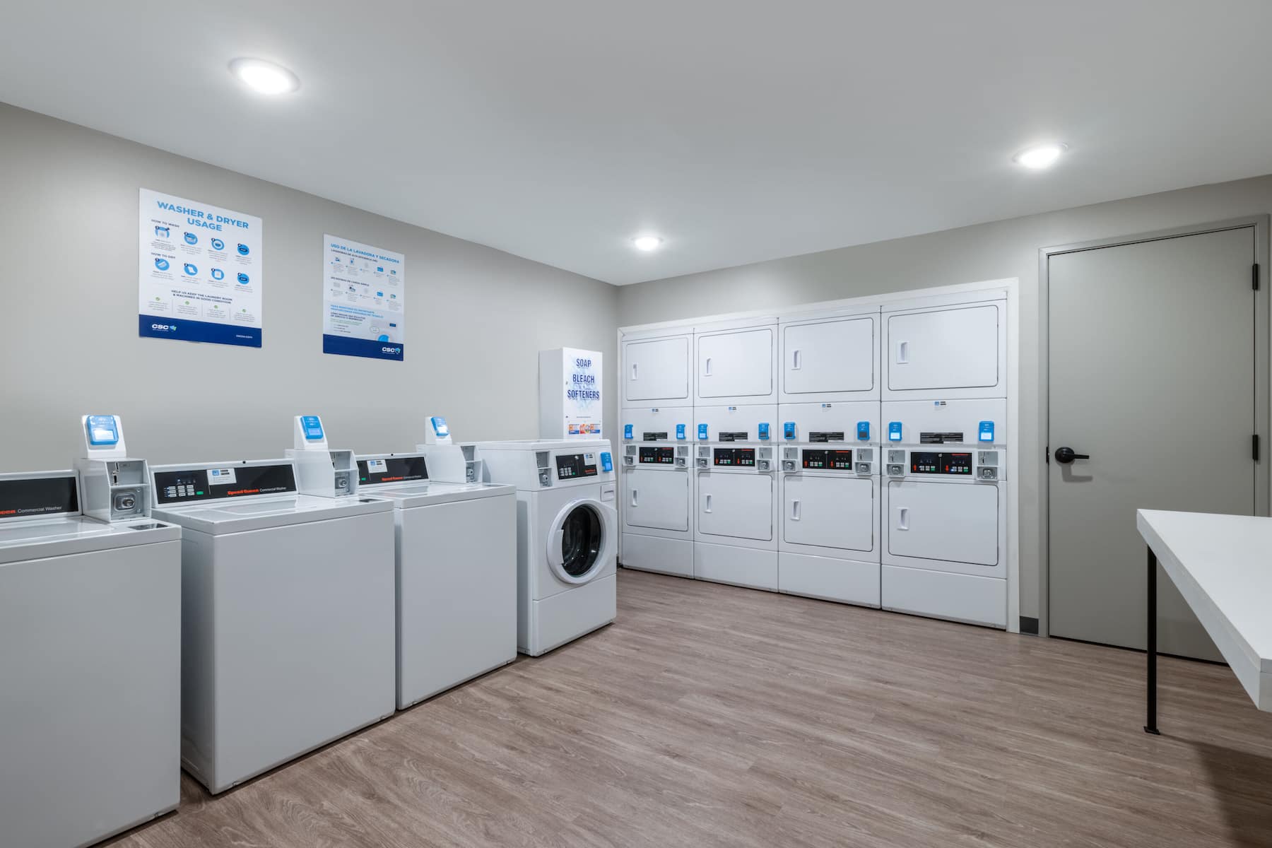Laundry facilities at ECHO Suites Extended Stay by Wyndham Spartanburg in Spartanburg, South Carolina