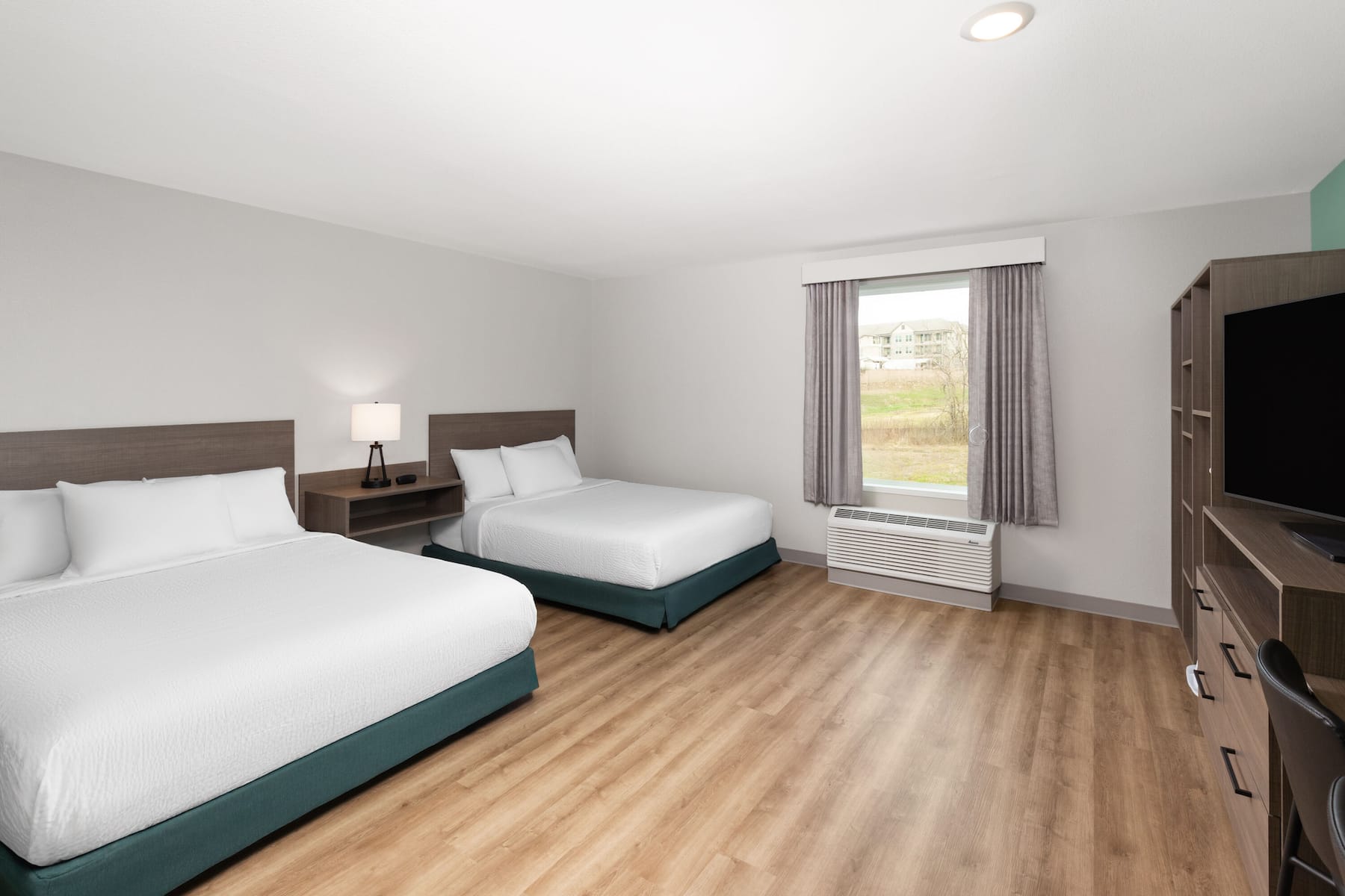 Guest room at the ECHO Suites Extended Stay by Wyndham Nashville/ Gallatin in Gallatin, Tennessee