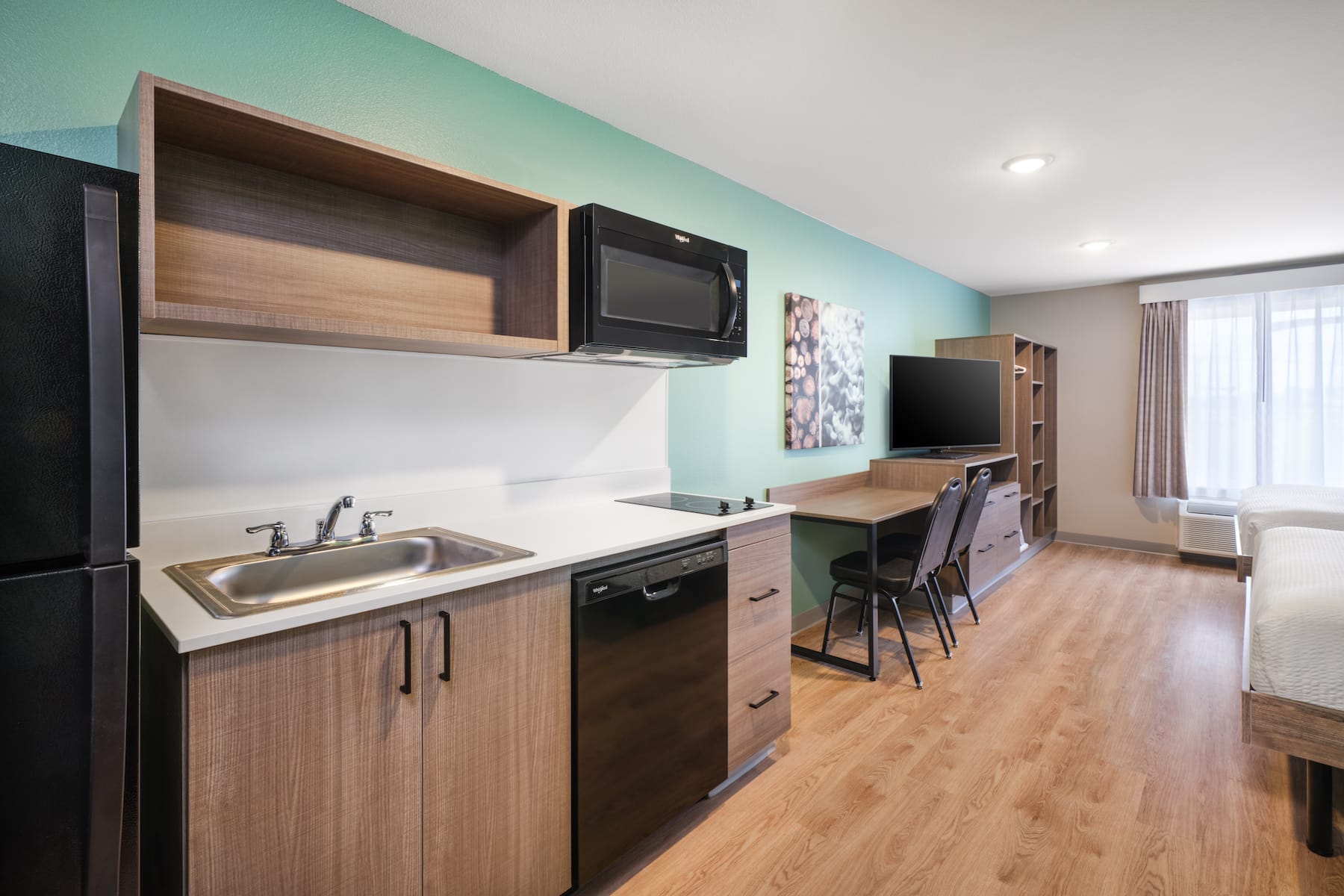 Guest room at the ECHO Suites Extended Stay by Wyndham Nashville/ Gallatin in Gallatin, Tennessee