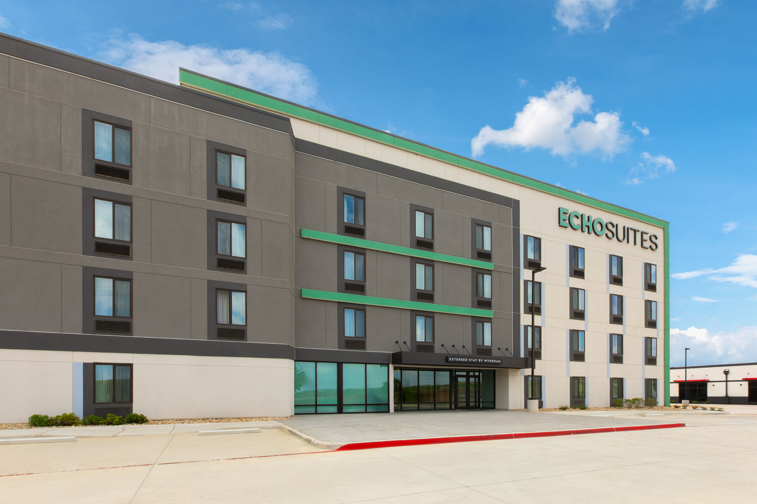 Exterior Day Image of ECHO Suites Extended Stay by Wyndham Fort Worth Alliance hotel in Fort Worth, Texas