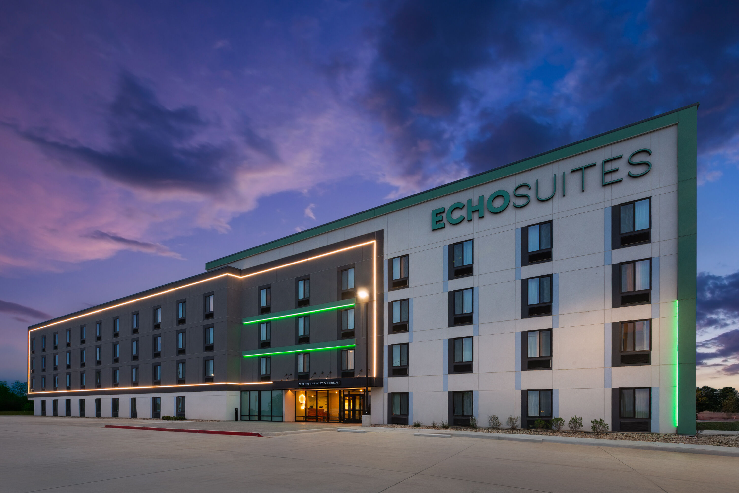 Exterior Dusk Image of ECHO Suites Extended Stay by Wyndham Fort Worth Alliance hotel in Fort Worth, Texas