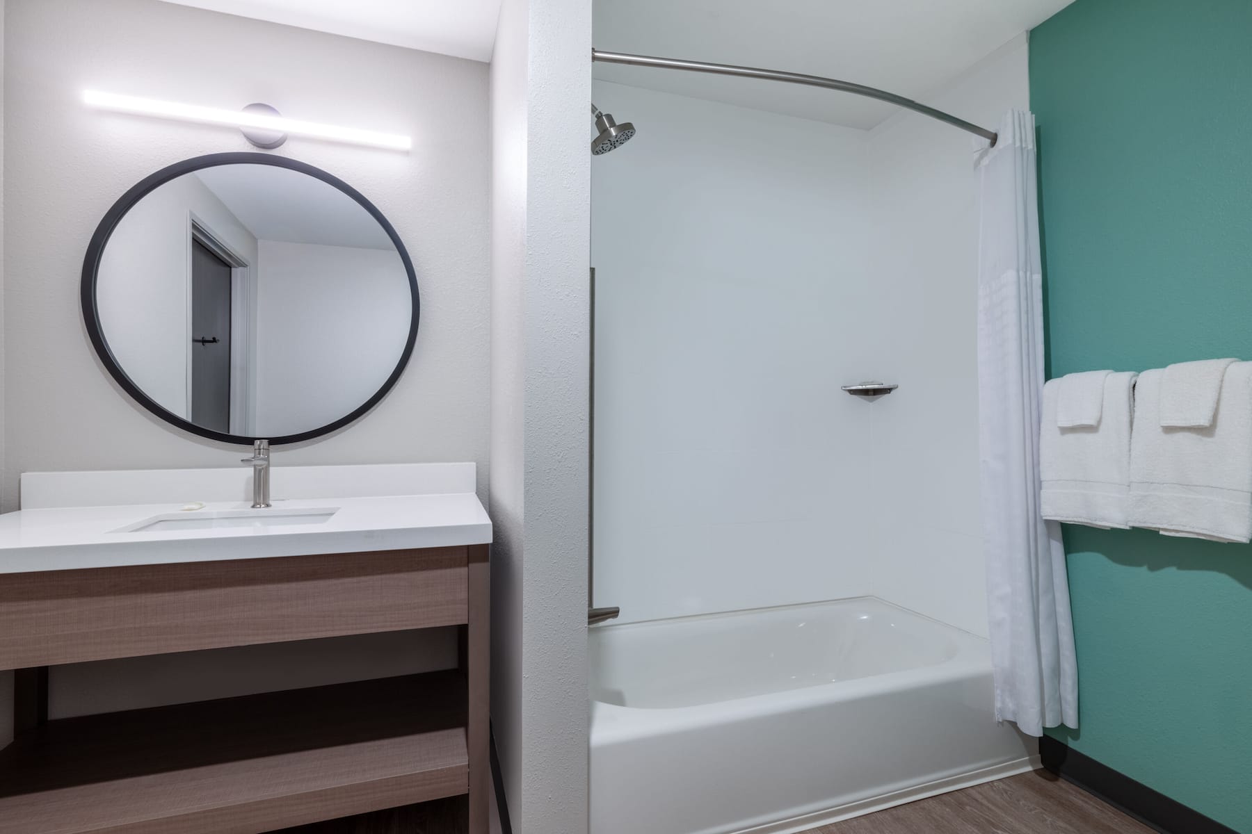 Guest room bath at the ECHO Suites Extended Stay by Wyndham Fort Worth Alliance in Fort Worth, Texas