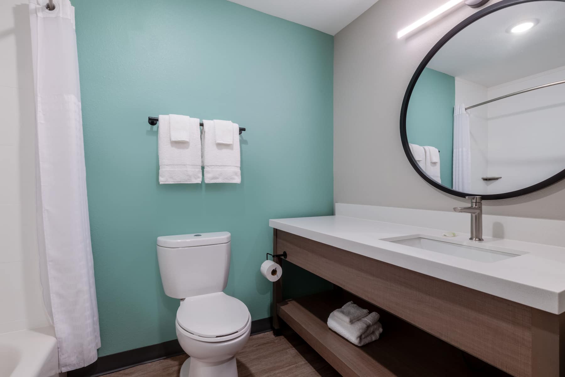 Guest room bath at the ECHO Suites Extended Stay by Wyndham Fort Worth Alliance in Fort Worth, Texas