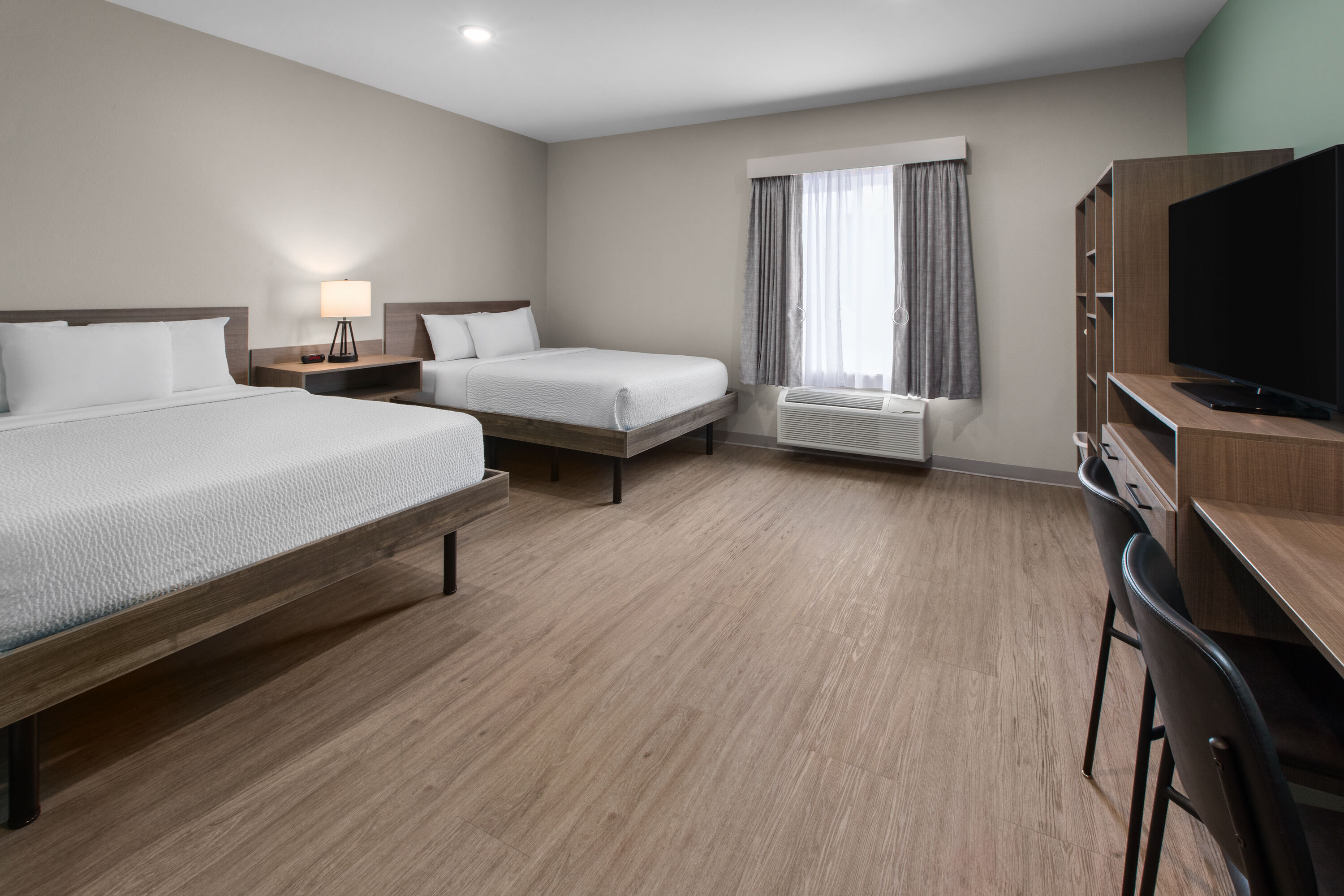 Guest room at the ECHO Suites Extended Stay by Wyndham Fort Worth Alliance in Fort Worth, Texas