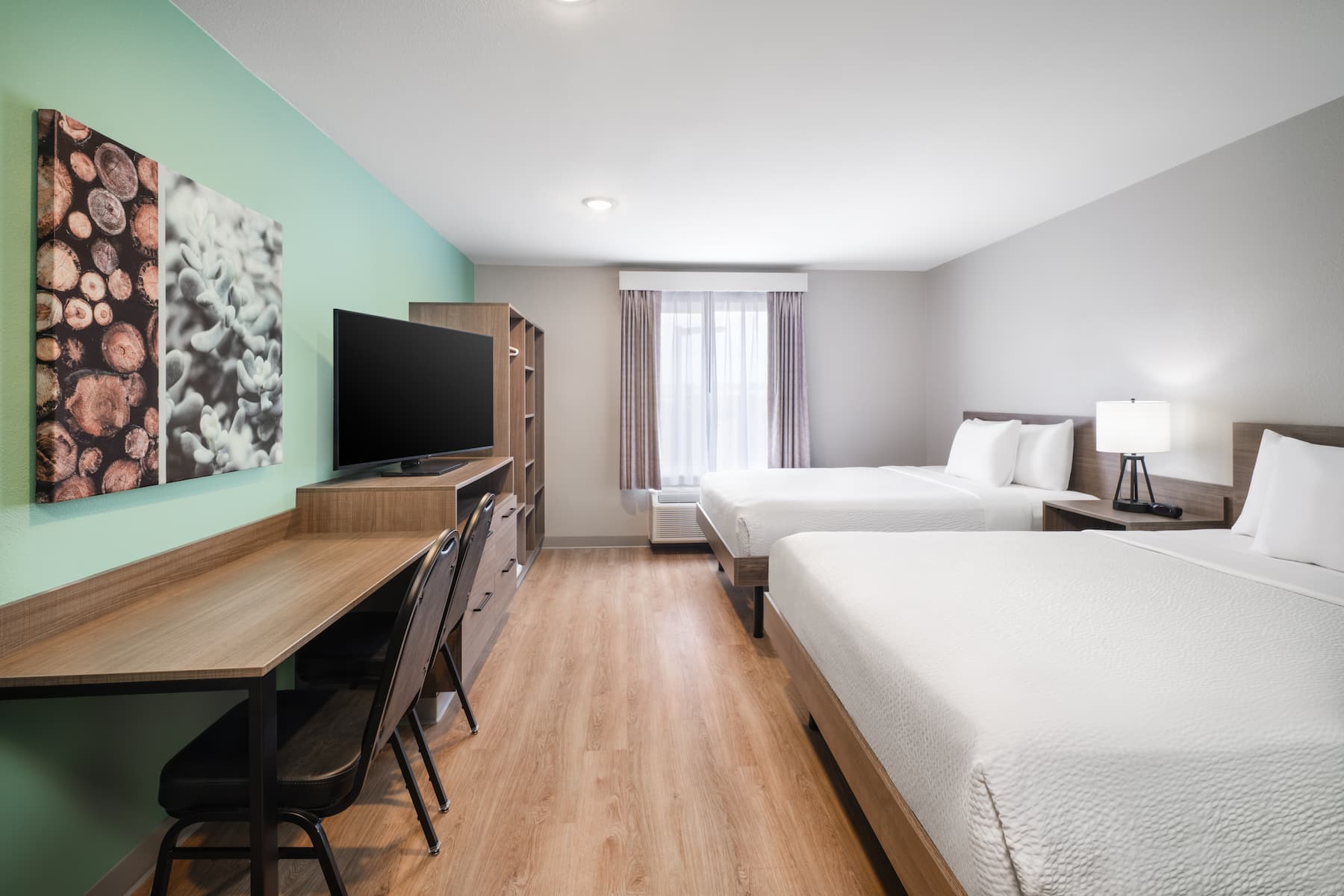 Guest room at the ECHO Suites Extended Stay by Wyndham Fort Worth Alliance in Fort Worth, Texas