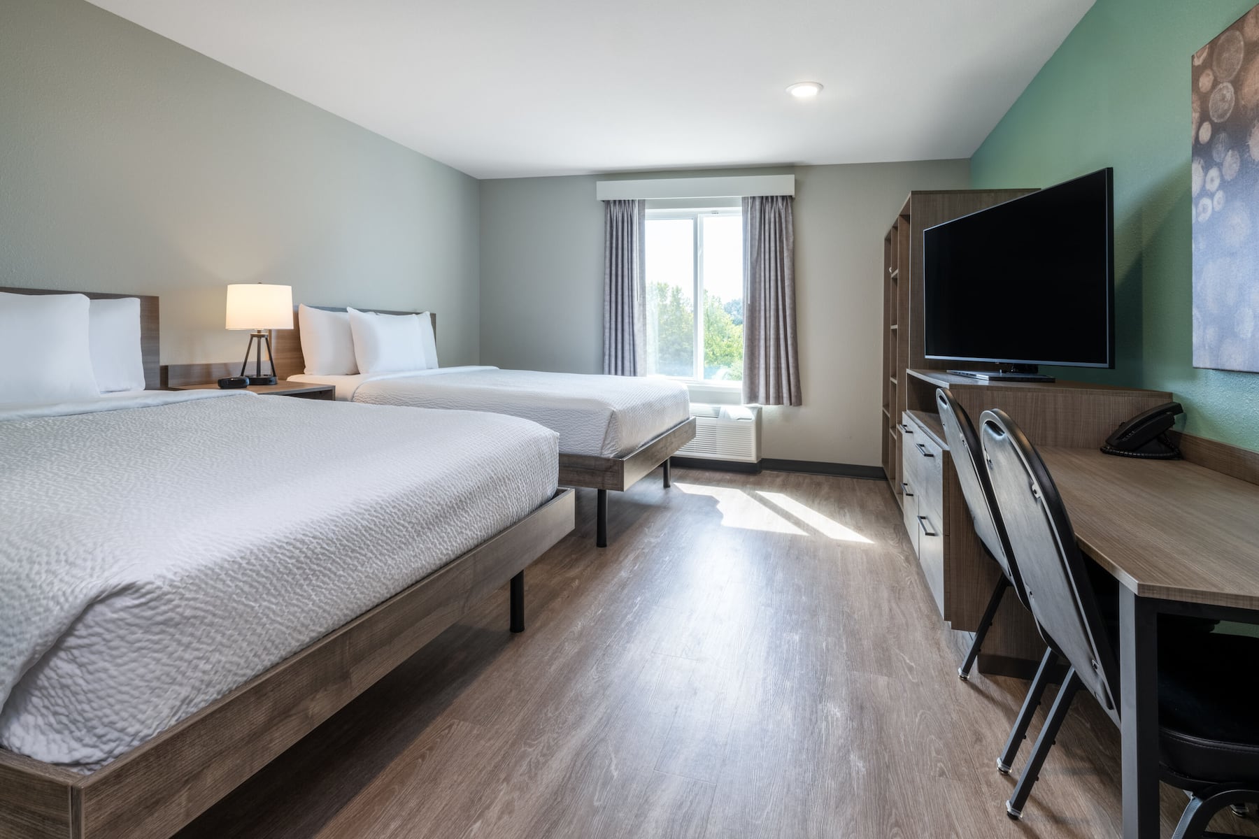 Guest room at the ECHO Suites Extended Stay by Wyndham Fort Worth Alliance in Fort Worth, Texas