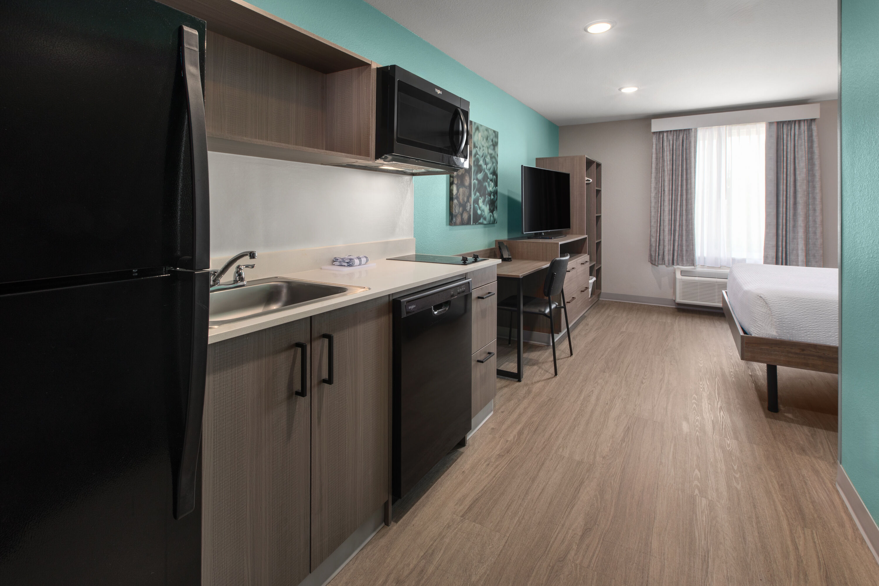 Guest room at the ECHO Suites Extended Stay by Wyndham Fort Worth Alliance in Fort Worth, Texas