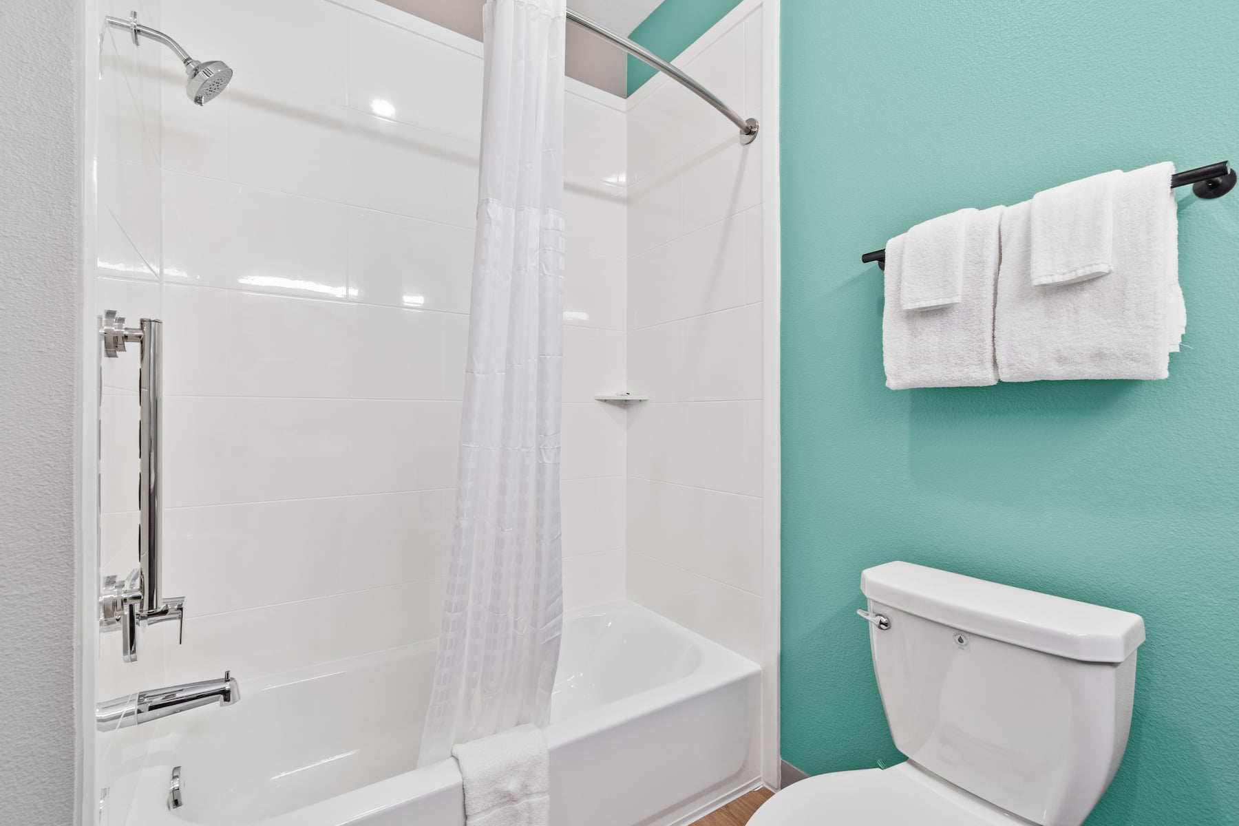 Guest room bath at the ECHO Suites Extended Stay by Wyndham Houston Katy West in Katy, Texas