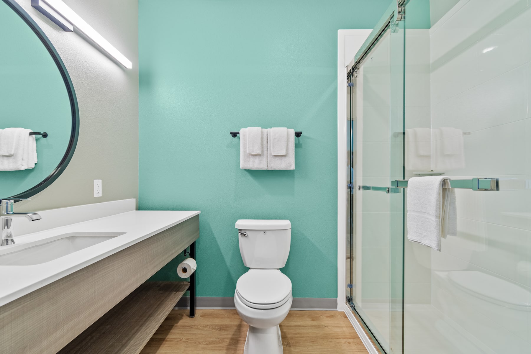 Guest room bath at the ECHO Suites Extended Stay by Wyndham Houston Katy West in Katy, Texas