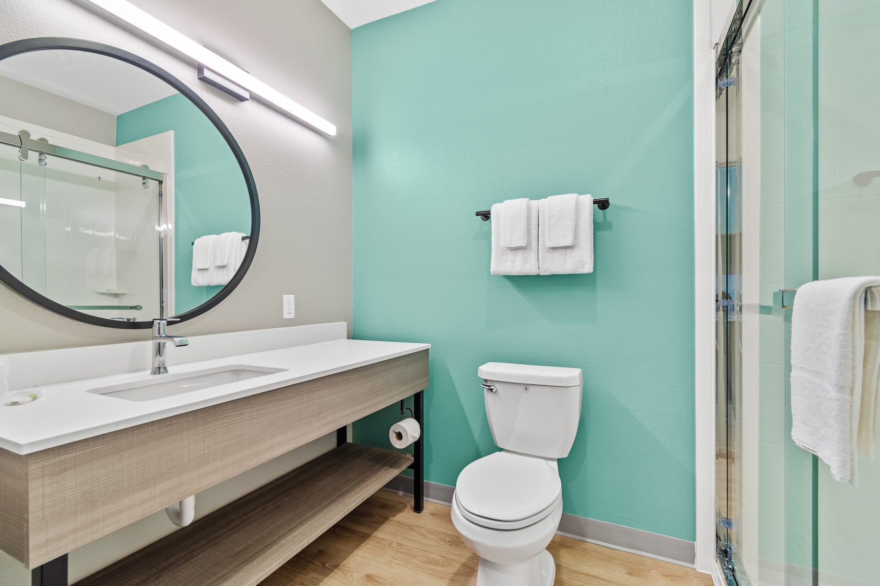 Guest room bath at the ECHO Suites Extended Stay by Wyndham Houston Katy West in Katy, Texas
