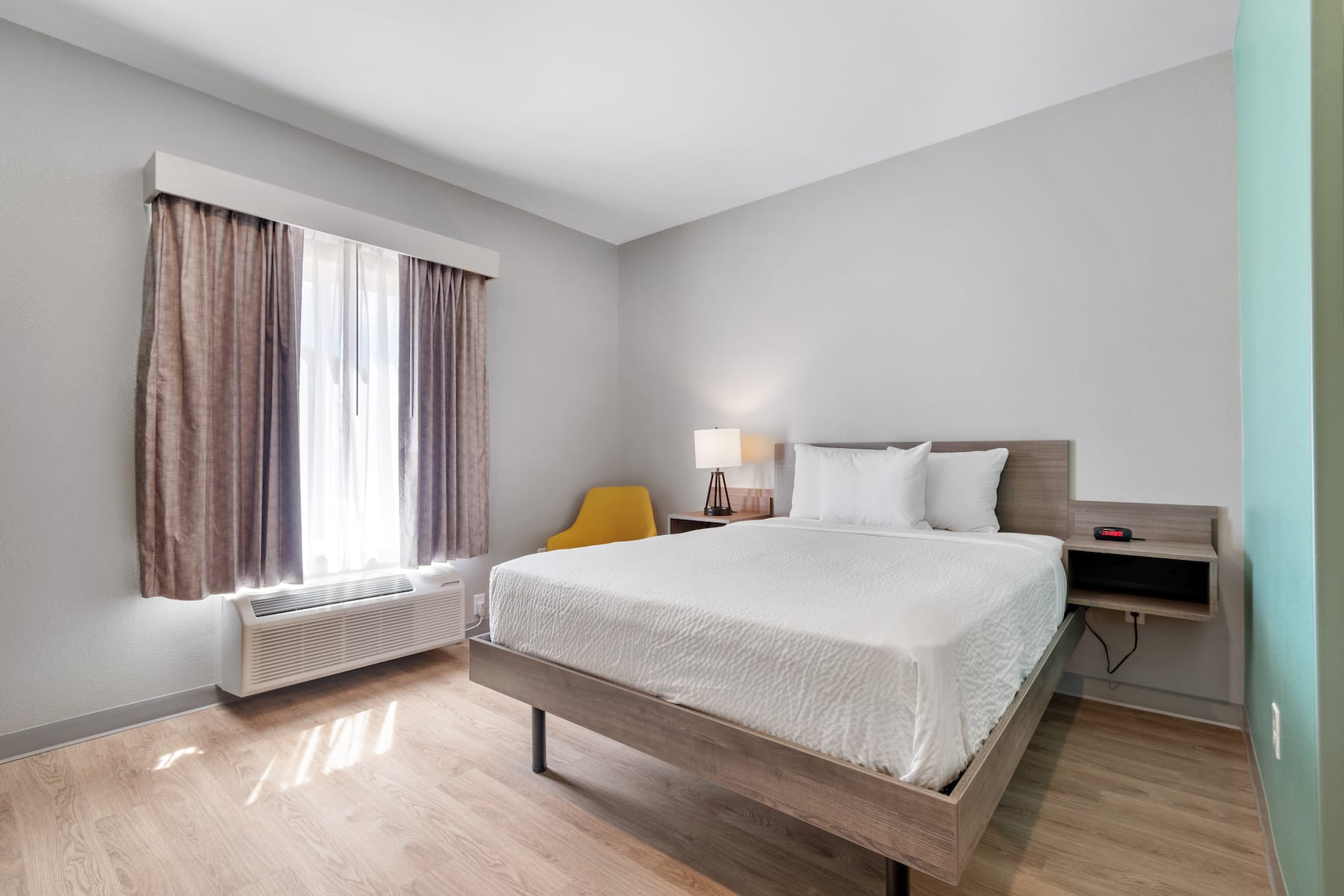Guest room at the ECHO Suites Extended Stay by Wyndham Houston Katy West in Katy, Texas