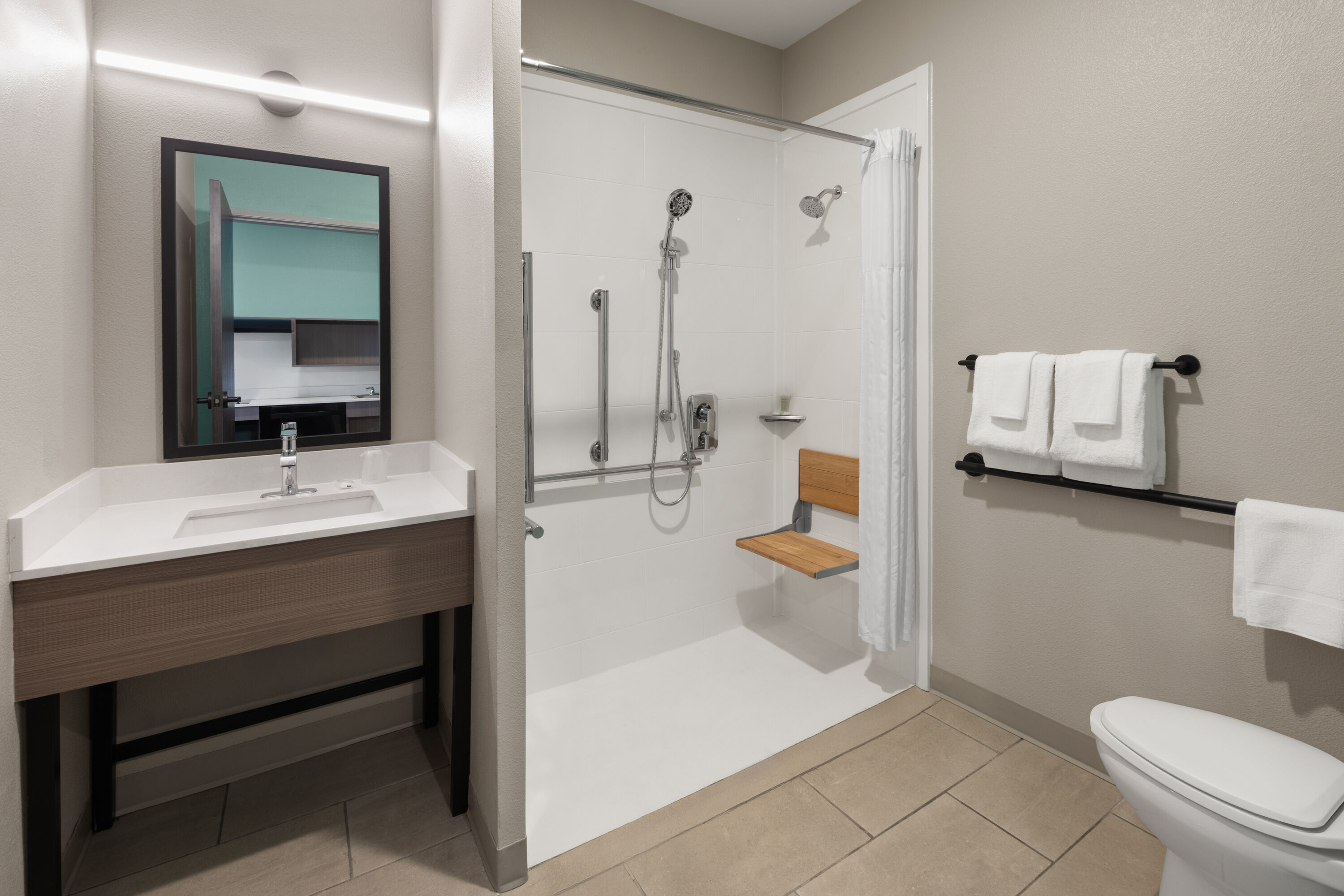 Guest room at the ECHO Suites Extended Stay by Wyndham Houston Katy West in Katy, Texas