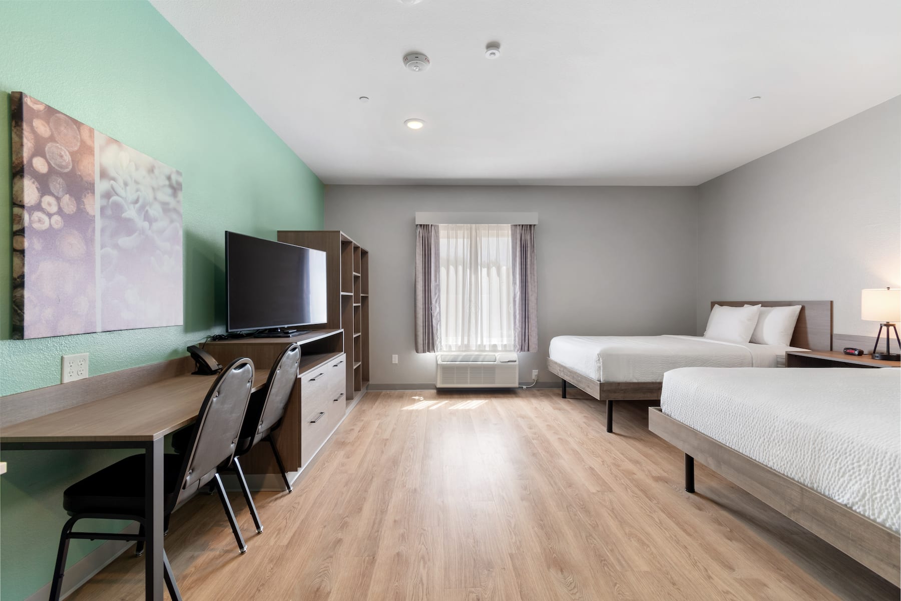 Guest room at the ECHO Suites Extended Stay by Wyndham Houston Katy West in Katy, Texas