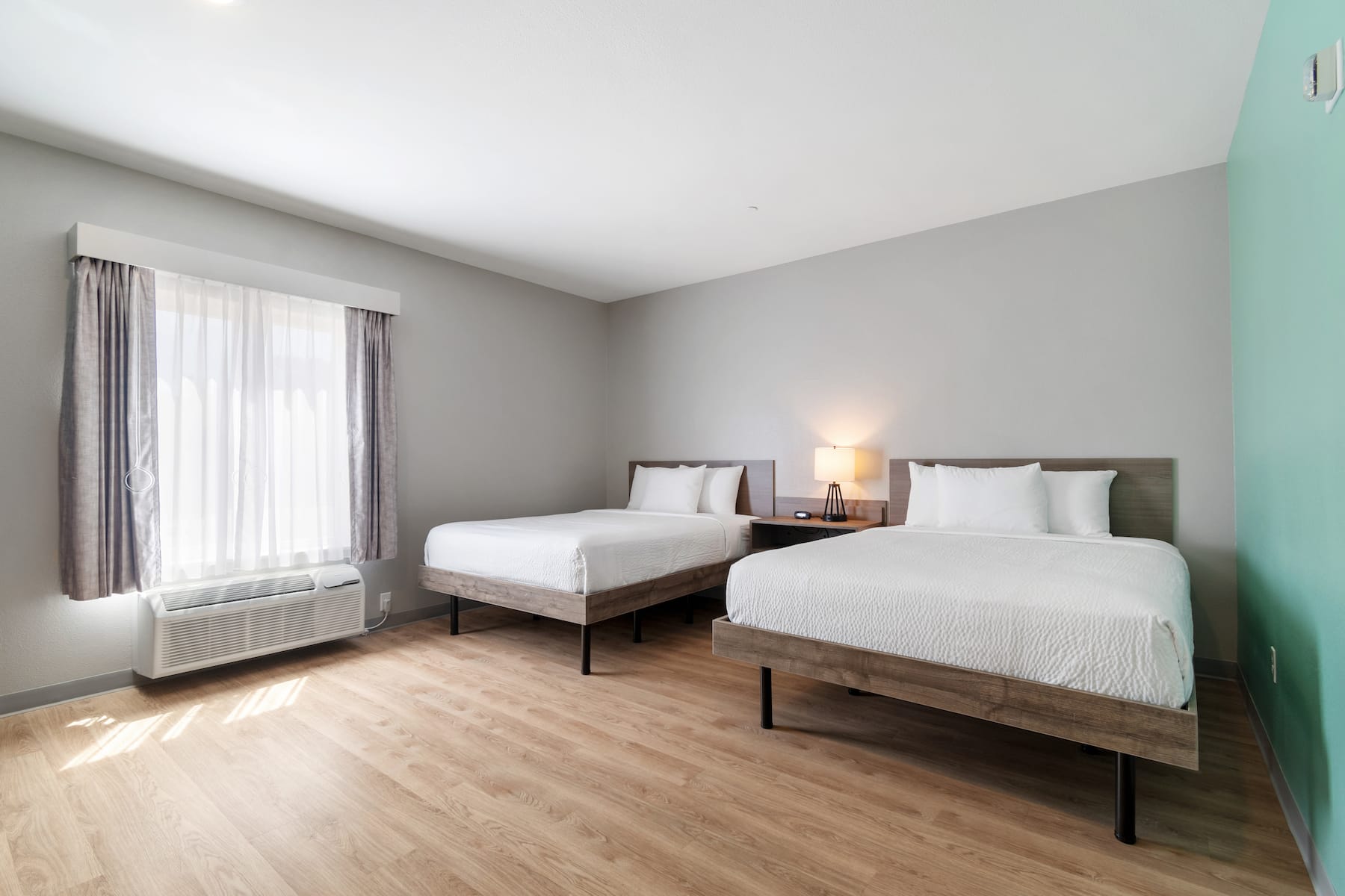 Guest room at the ECHO Suites Extended Stay by Wyndham Houston Katy West in Katy, Texas