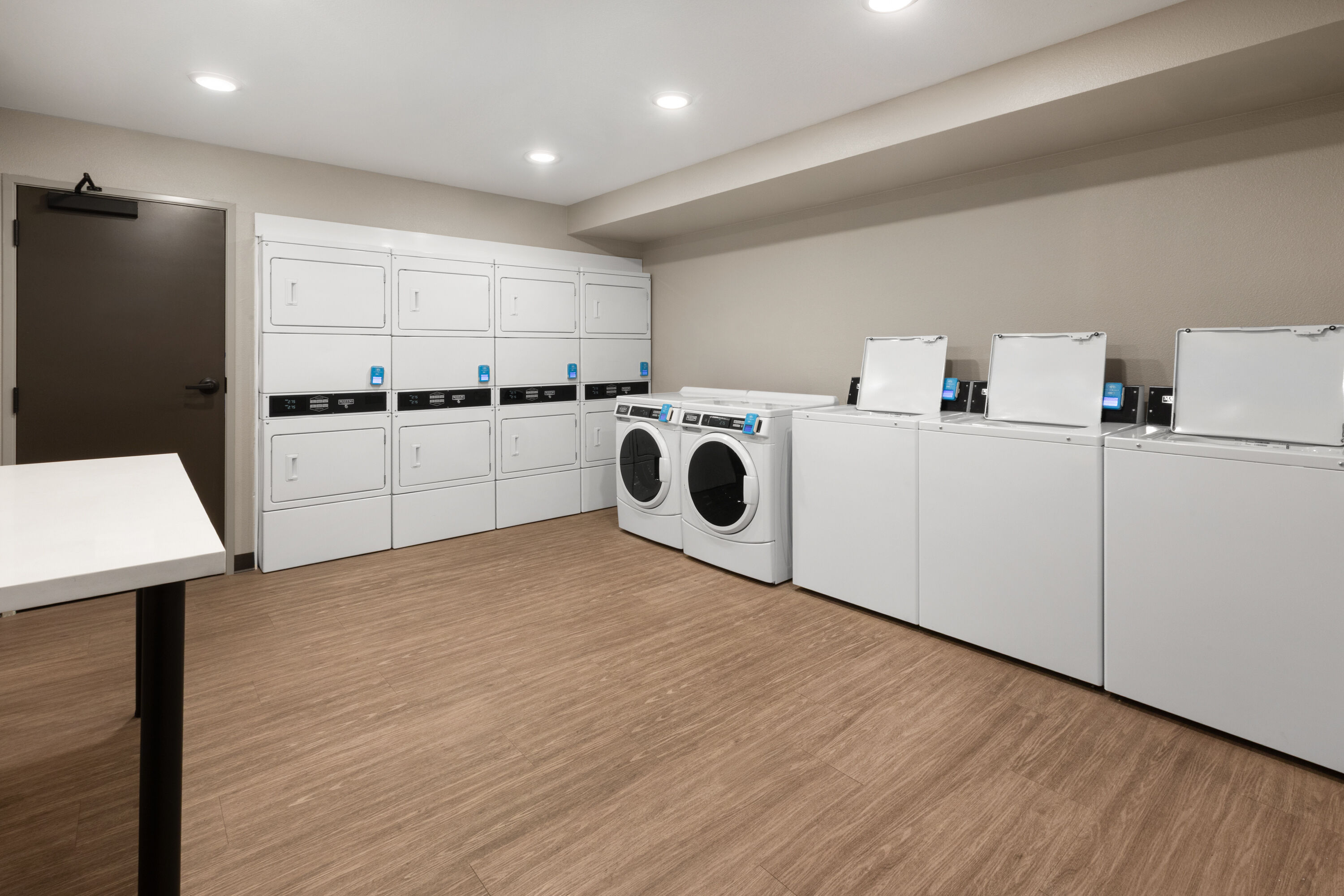 Laundry facilities at ECHO Suites Extended Stay by Wyndham Houston Katy West in Katy, Texas