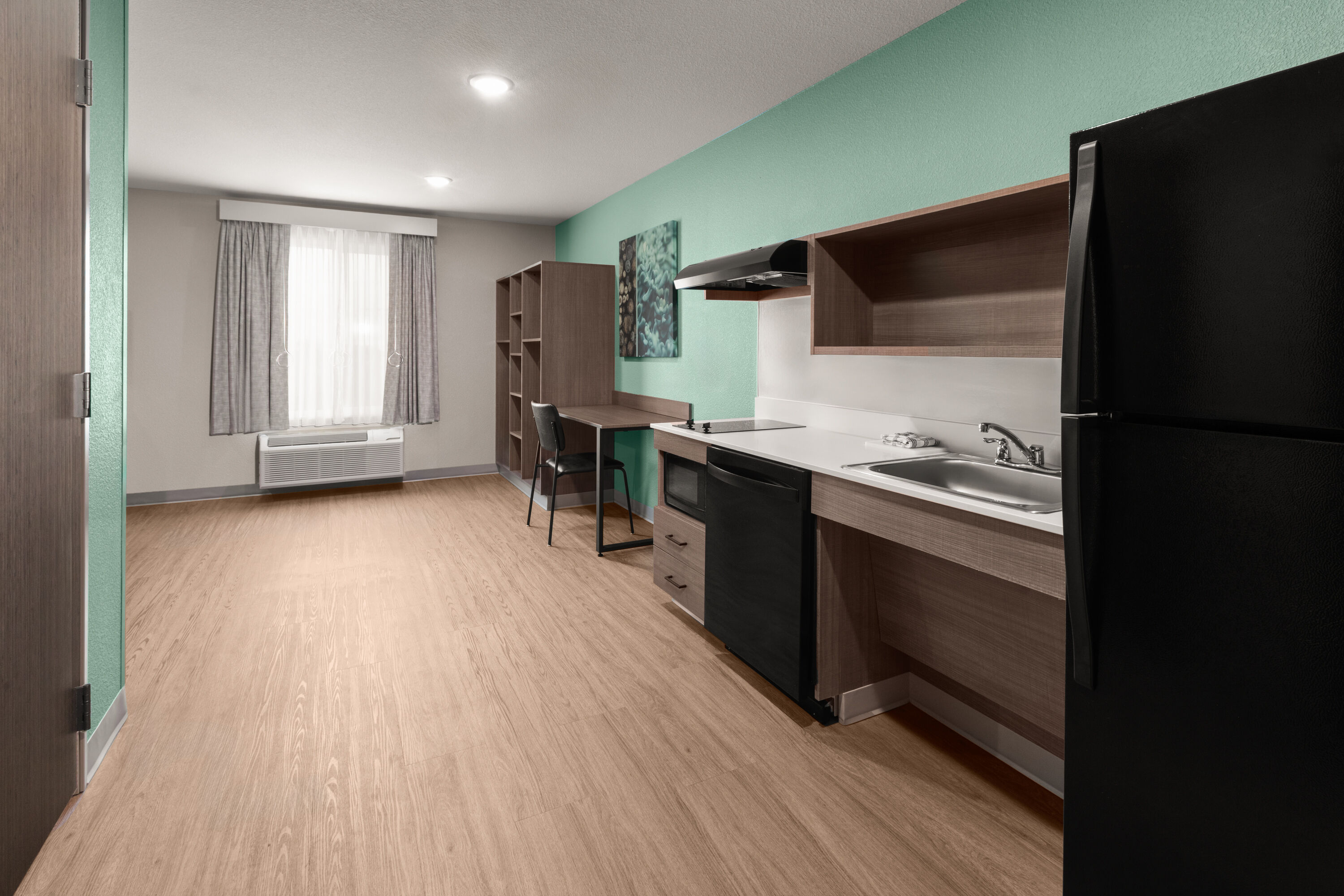 Guest room at the ECHO Extended Stay by Wyndham Houston Pasadena Fairway Plaza in Pasadena, Texas
