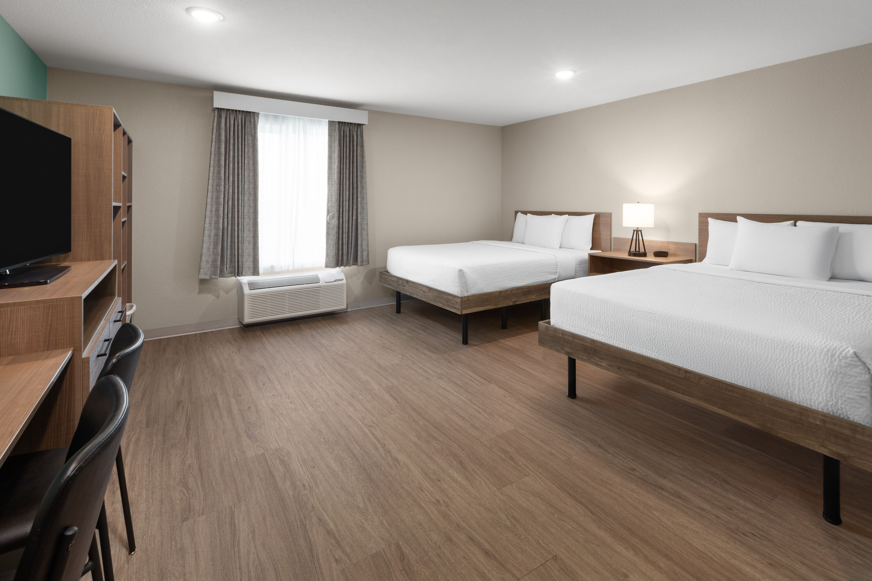 Guest room at the ECHO Extended Stay by Wyndham Houston Pasadena Fairway Plaza in Pasadena, Texas