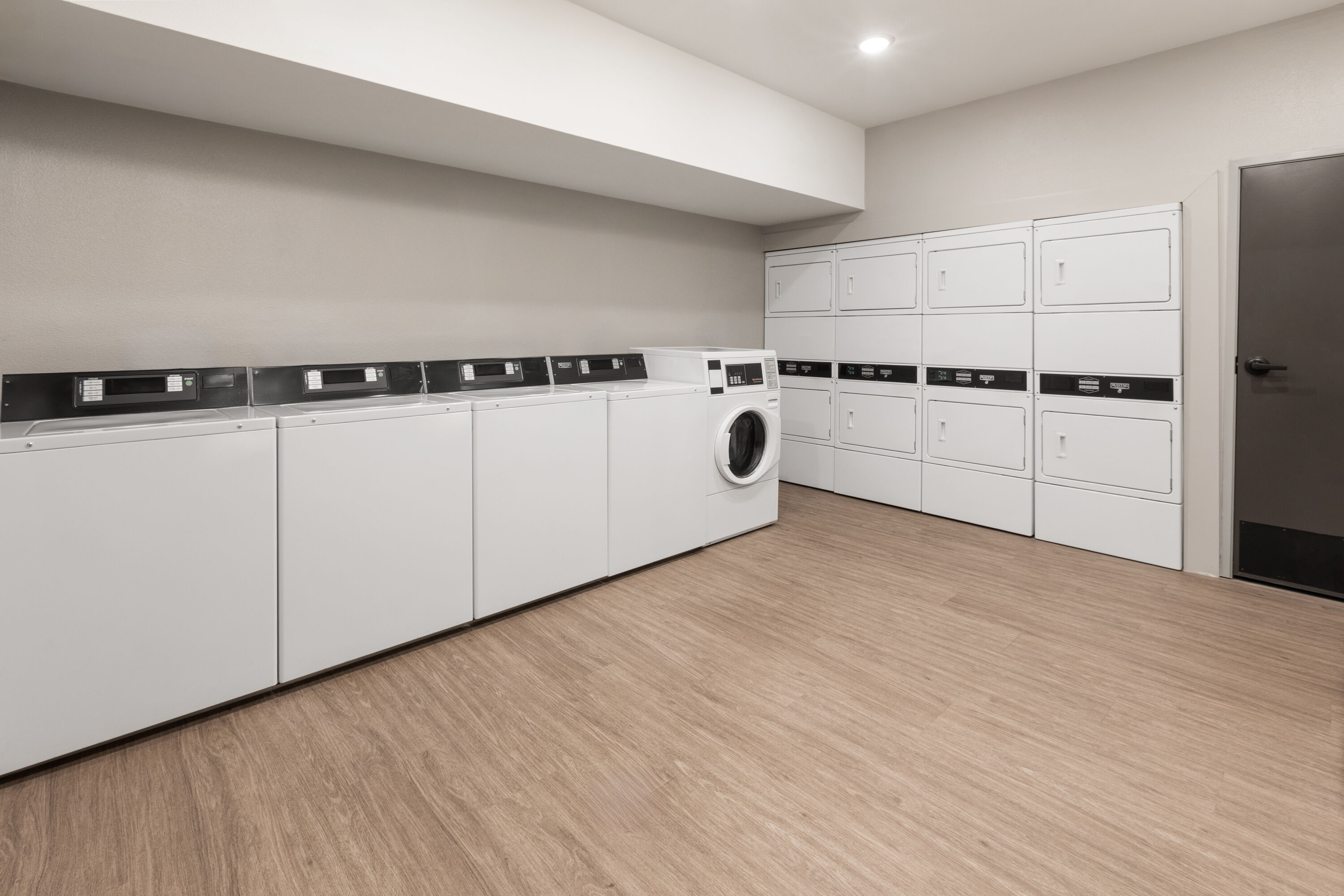 Laundry facilities at ECHO Extended Stay by Wyndham Houston Pasadena Fairway Plaza in Pasadena, Texas