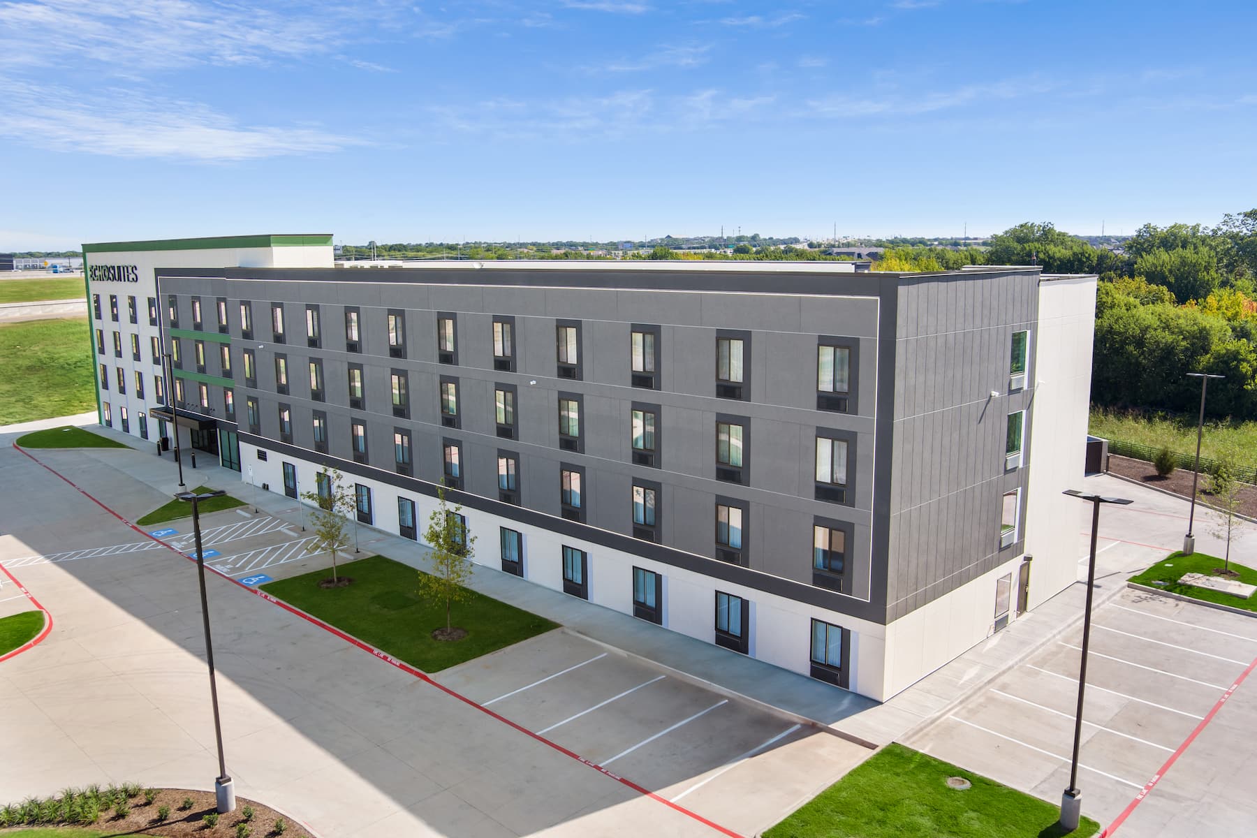 Exterior of ECHO Suites Extended Stay by Wyndham Dallas Plano/Frisco hotel in Plano, Texas