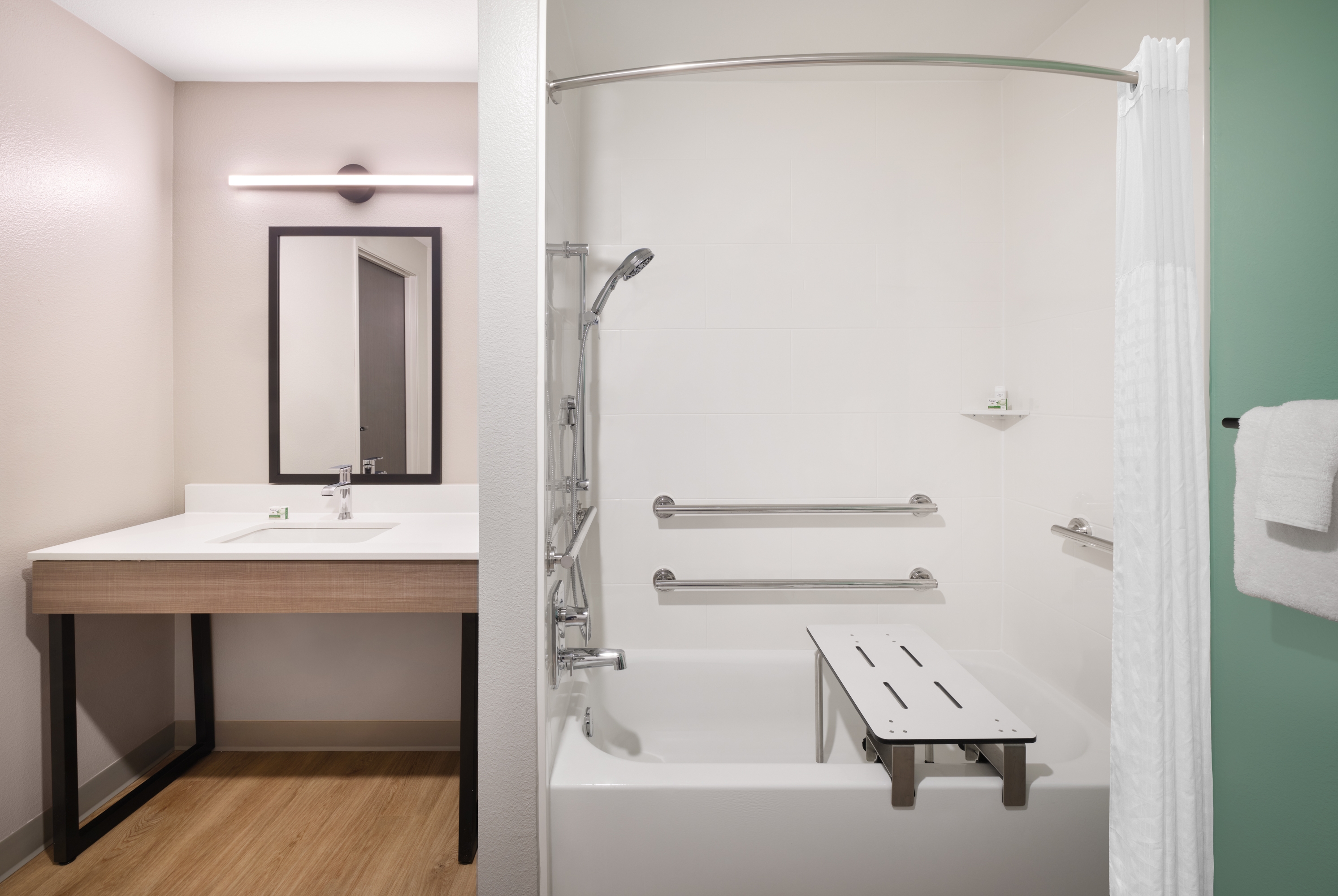 Guest room bath at the ECHO Suites Extended Stay by Wyndham Austin Round Rock in Round Rock, Texas