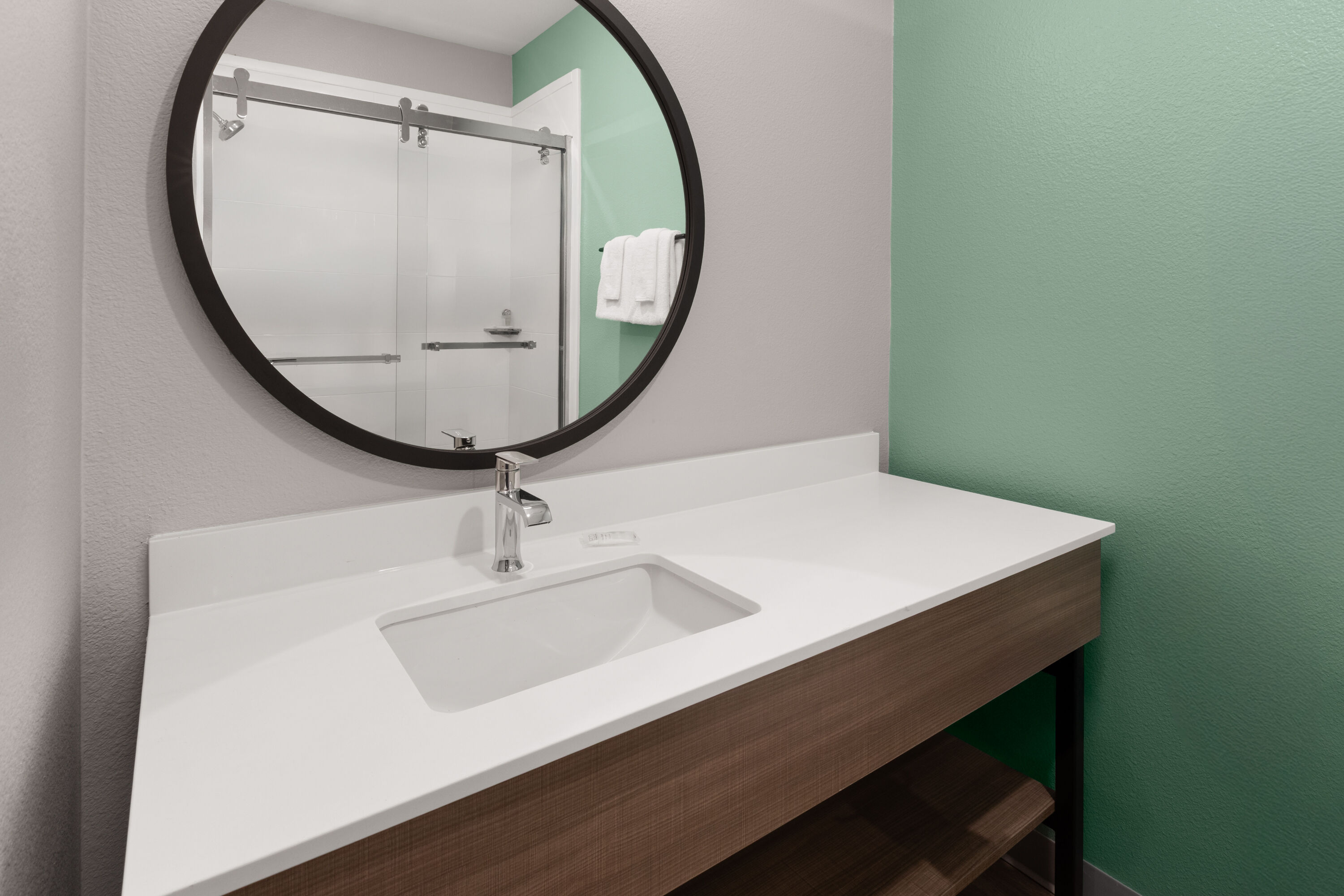 Guest room bath at the ECHO Suites Extended Stay by Wyndham Austin Round Rock in Round Rock, Texas