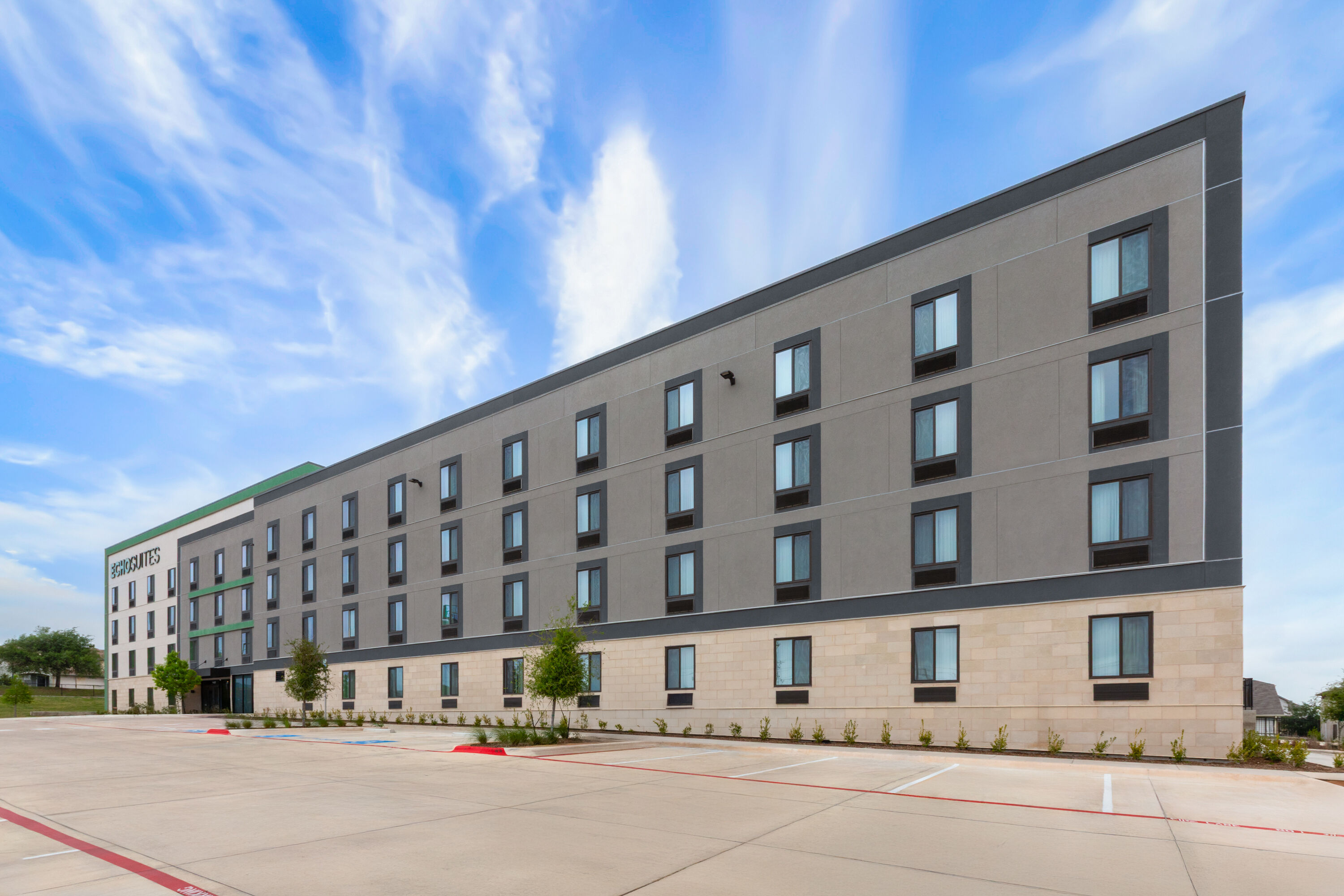 Exterior Day Image of ECHO Suites Extended Stay by Wyndham Austin Round Rock hotel in Round Rock, Texas