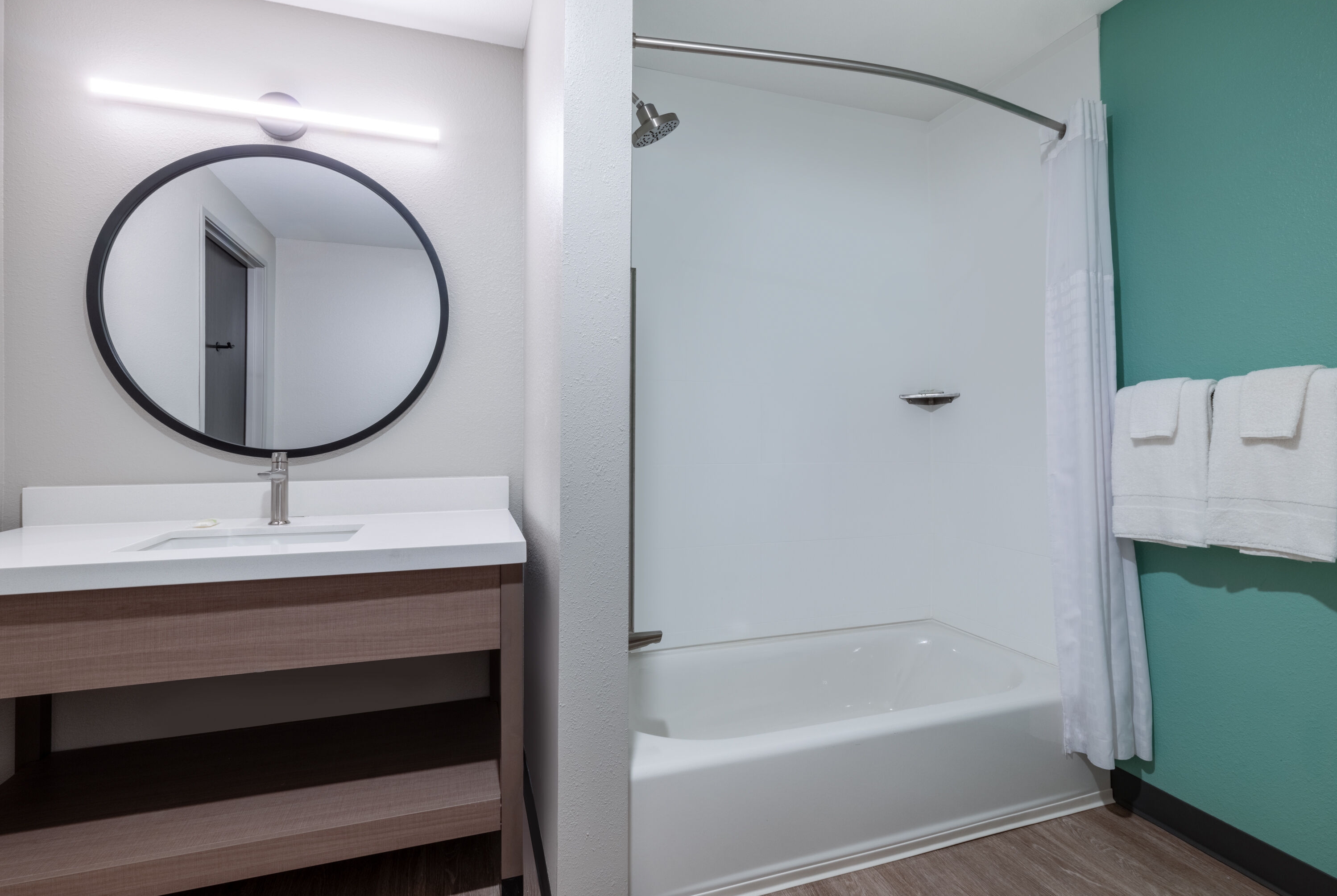 Guest room bath at the ECHO Suites Extended Stay by Wyndham Austin Round Rock in Round Rock, Texas