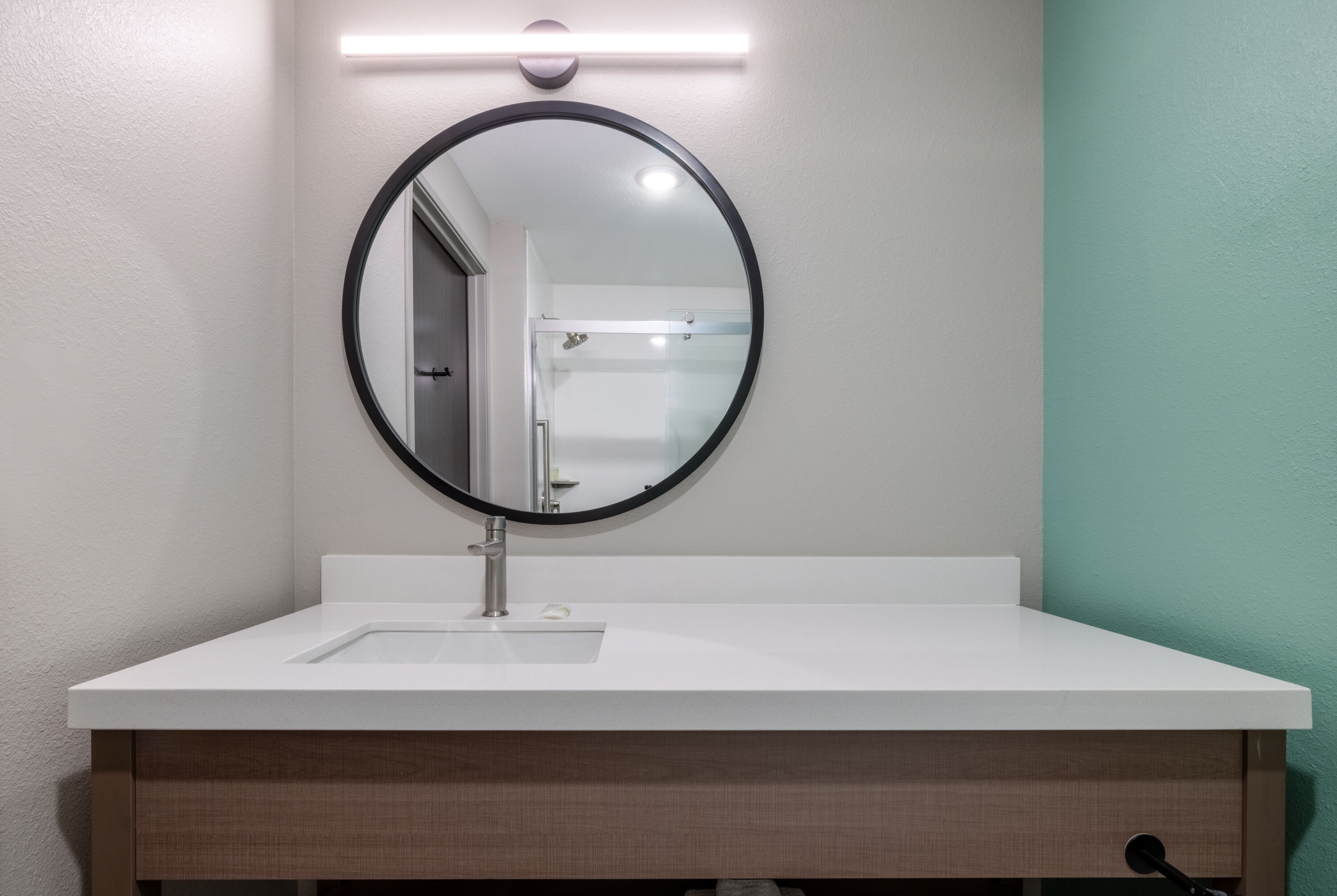 Guest room bath at the ECHO Suites Extended Stay by Wyndham Austin Round Rock in Round Rock, Texas