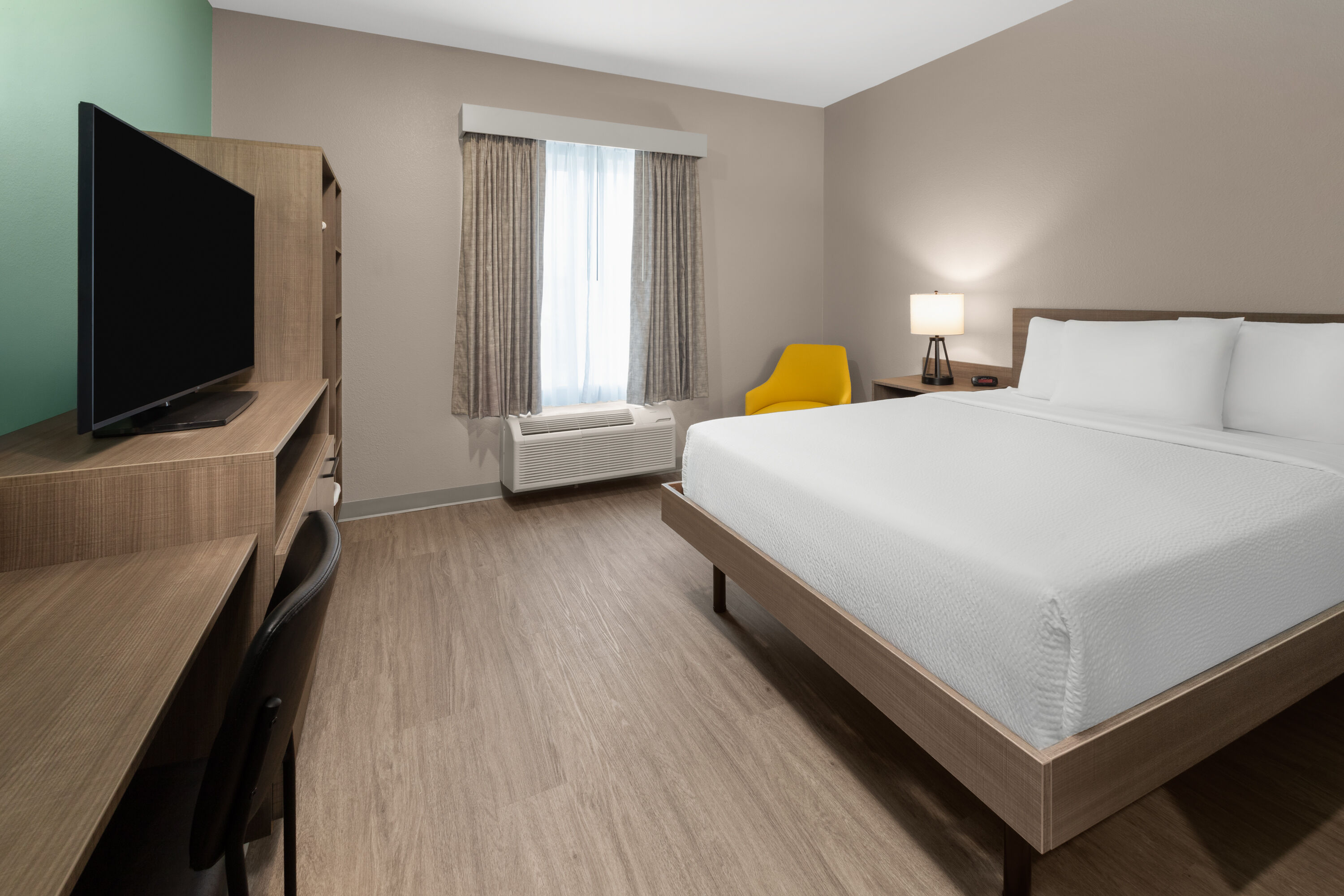 Guest room at the ECHO Suites Extended Stay by Wyndham Austin Round Rock in Round Rock, Texas