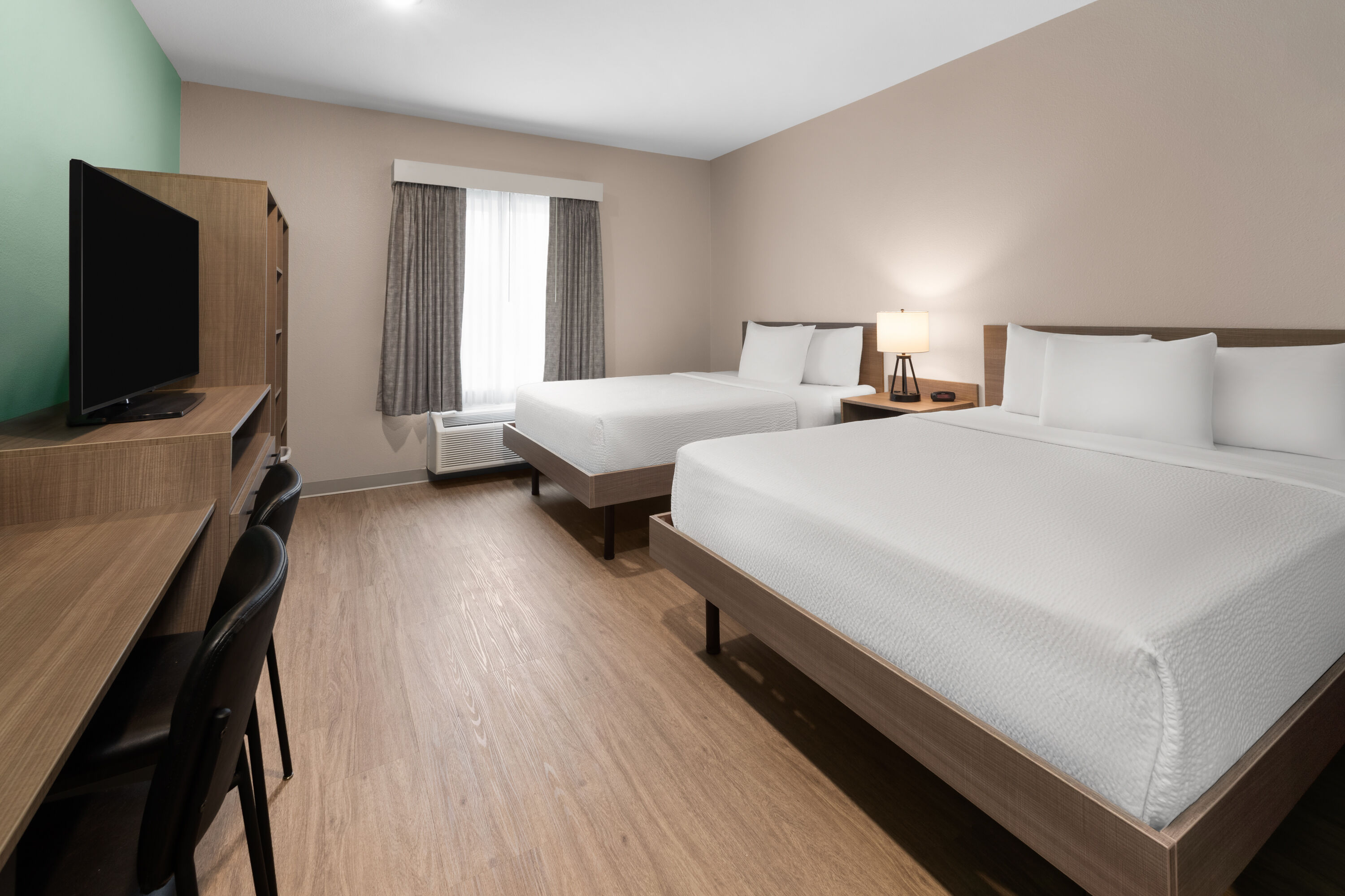 Guest room at the ECHO Suites Extended Stay by Wyndham Austin Round Rock in Round Rock, Texas