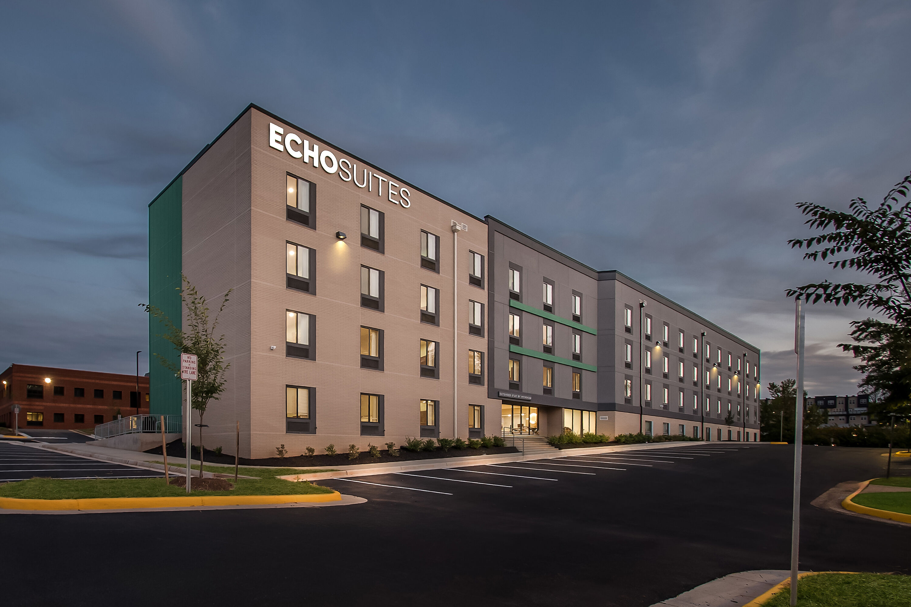 Exterior Night Image of ECHO Suites Extended Stay by Wyndham Sterling hotel in Sterling, Virginia
