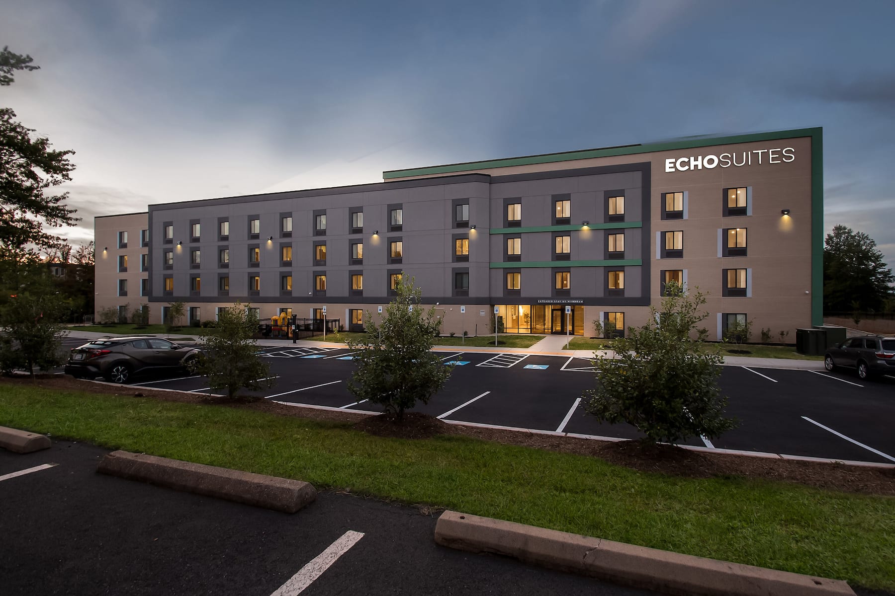 Exterior Night Image of ECHO Suites Extended Stay by Wyndham Sterling hotel in Sterling, Virginia