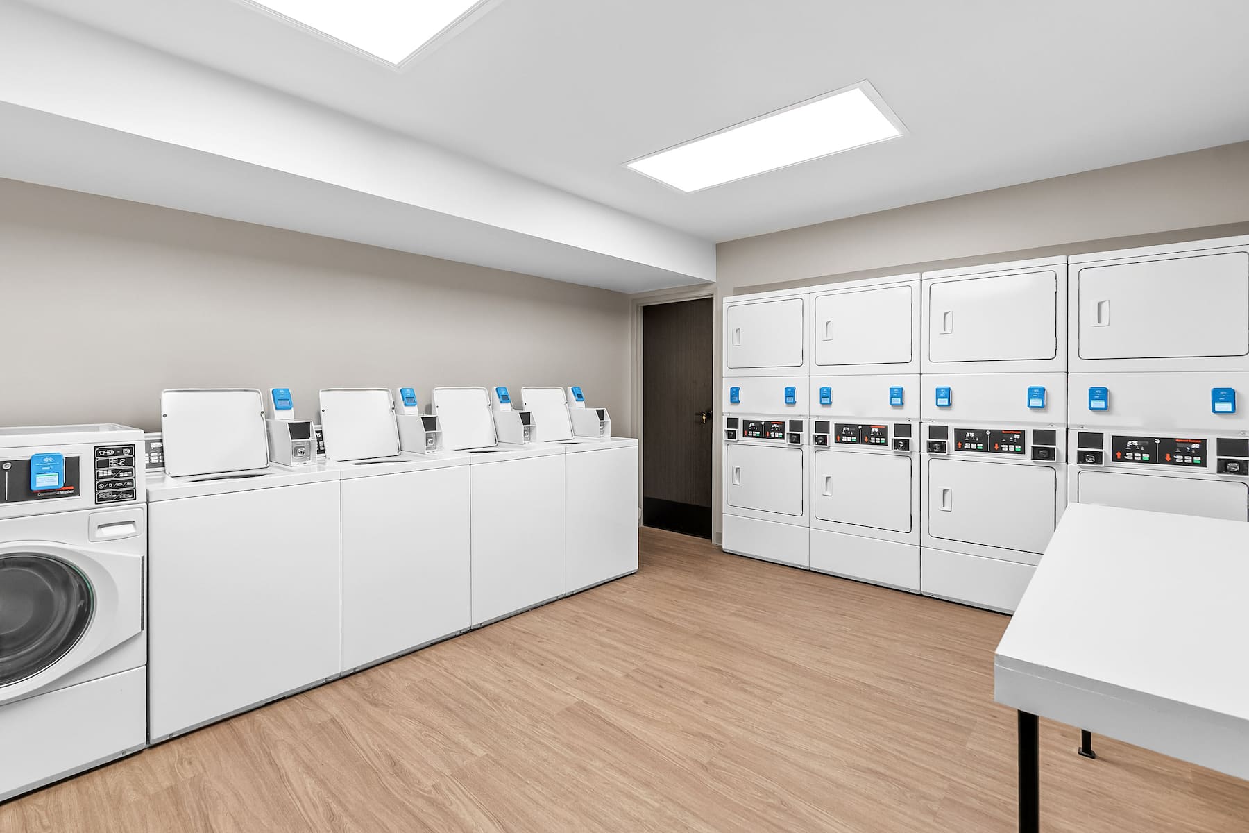 Laundry facilities at ECHO Suites Extended Stay by Wyndham Sterling in Sterling, Virginia