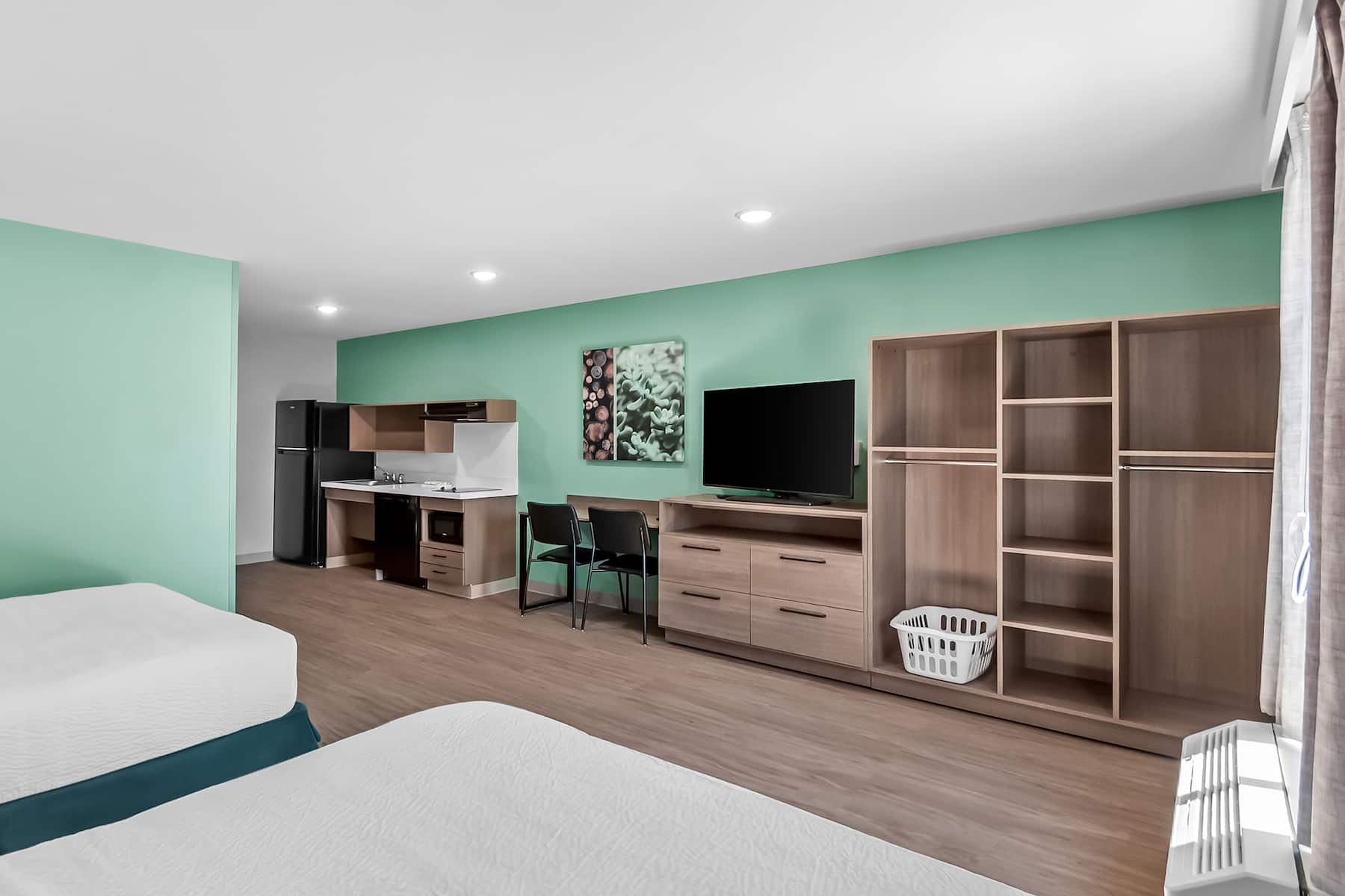 Double bed guest room at the ECHO Suites Extended Stay by Wyndham Sterling in Sterling, Virginia
