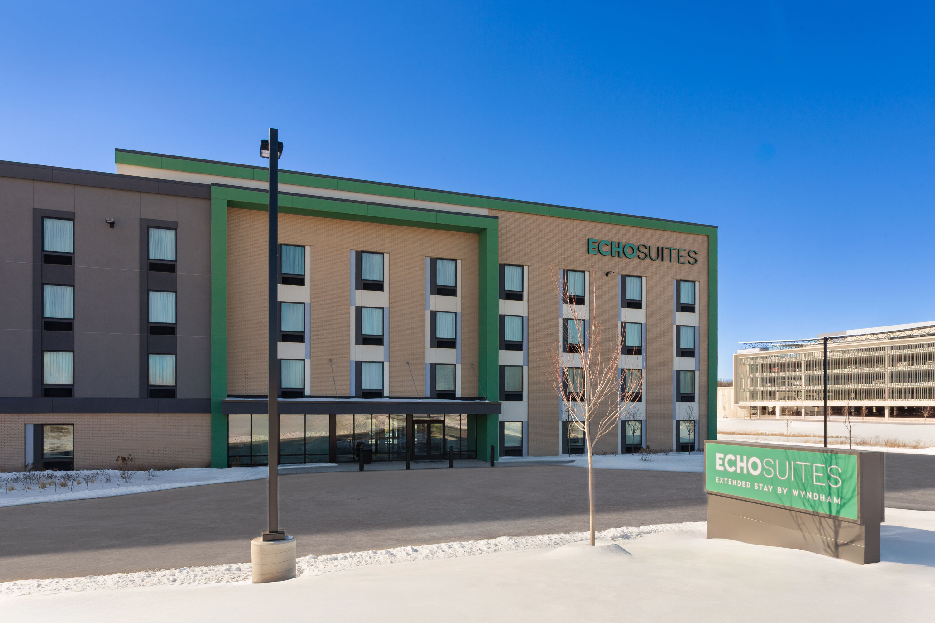 Exterior Day Image of ECHO Suites Extended Stay by Wyndham Madison hotel in Madison, Wisconsin